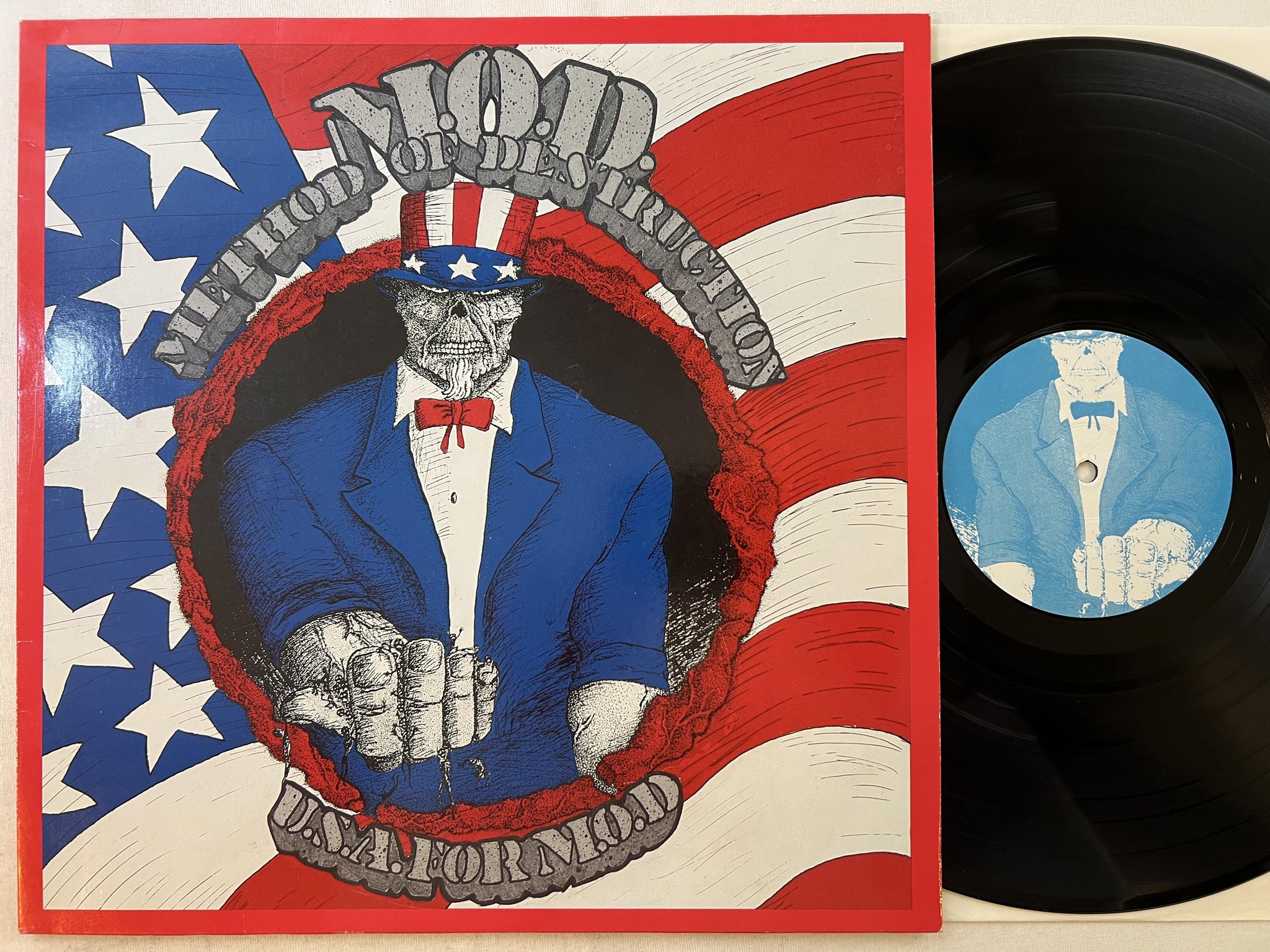 Omslagsbild för skivan M.O.D. USA for MOD LP -87 Ger NOISE INTERNATIONAL N 0089 ** trash **