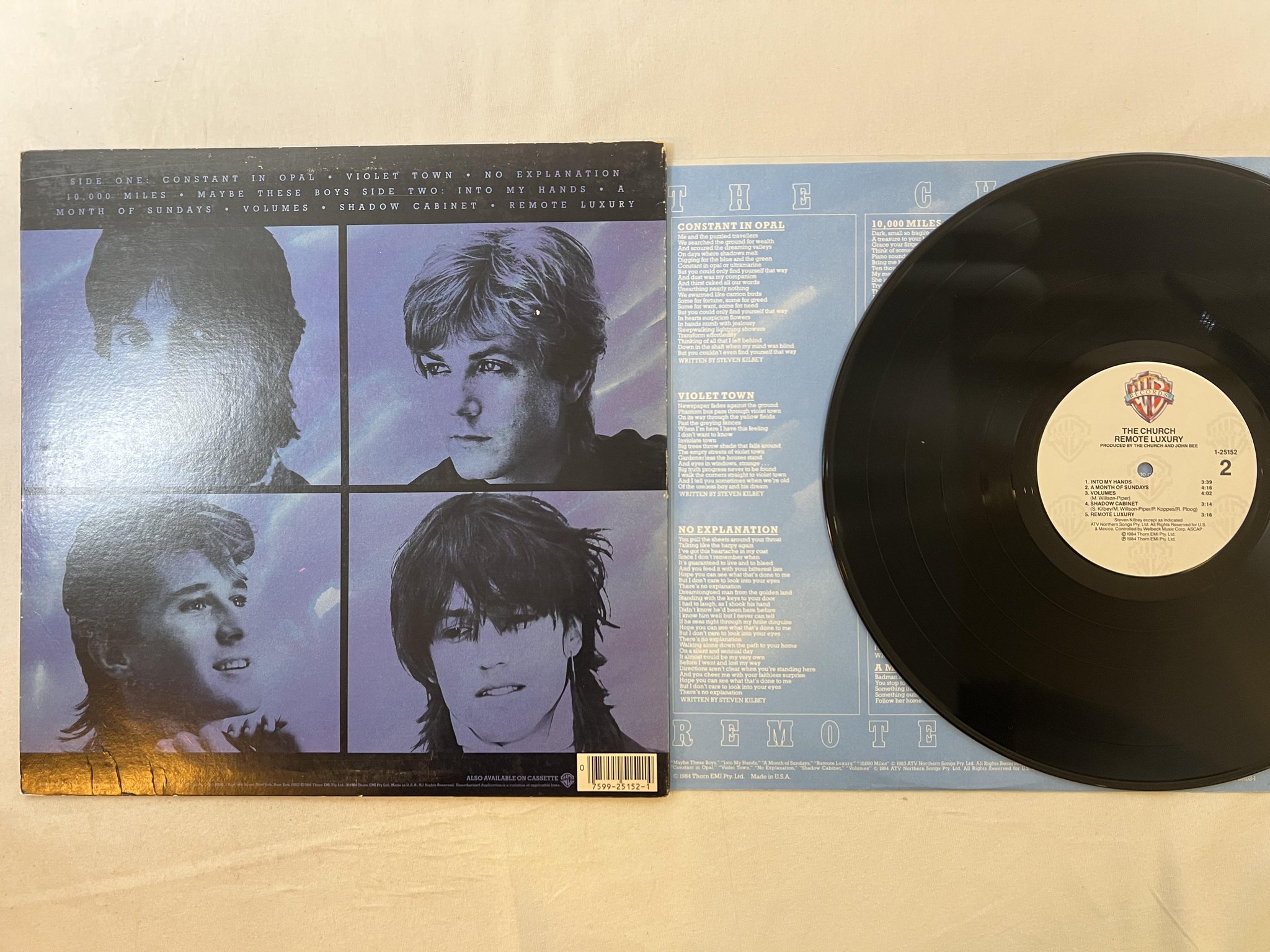 Omslagsbild för skivan THE CHURCH remote luxury LP -84 US WARNER 1-25152