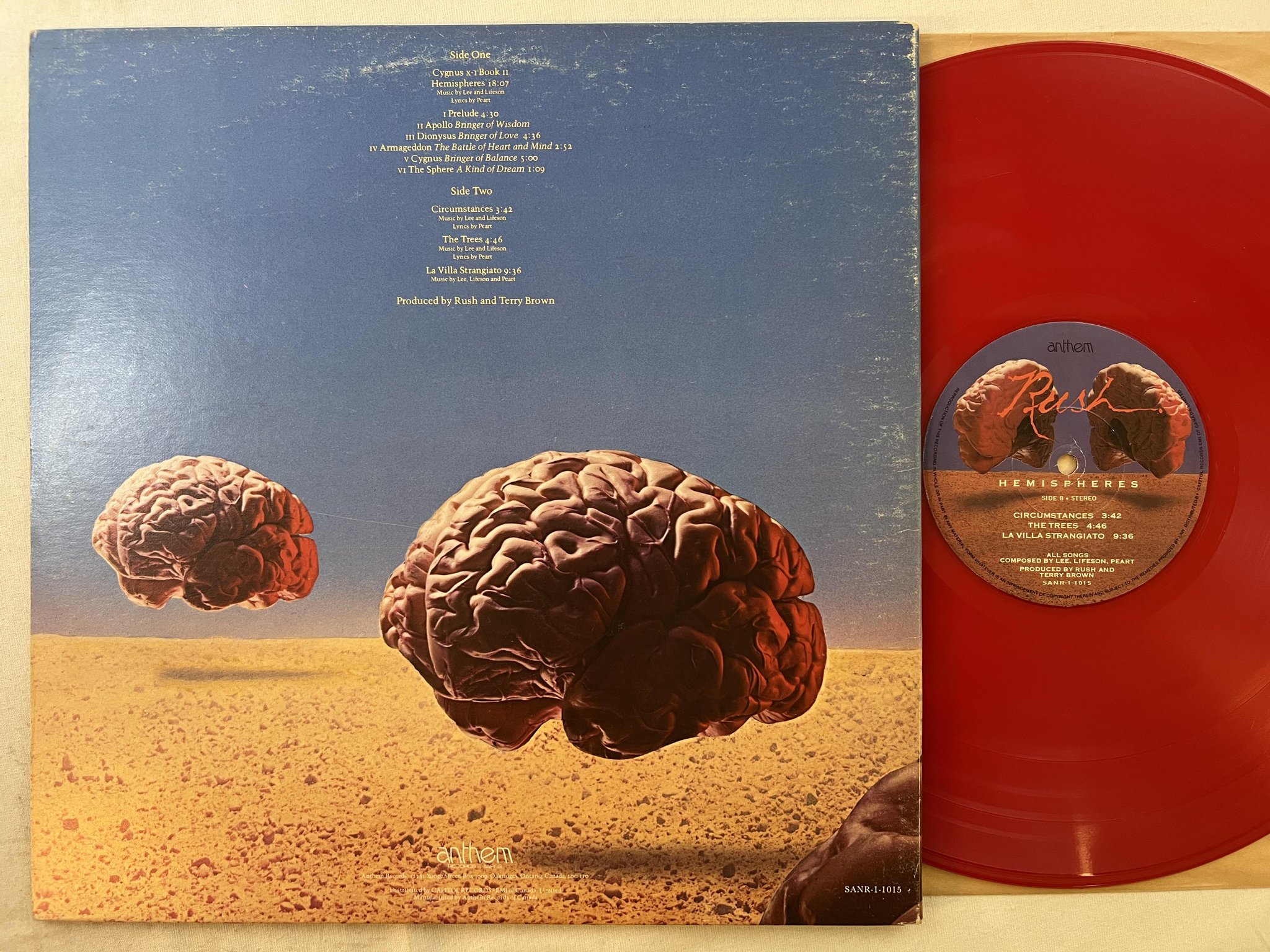 Omslagsbild för skivan RUSH hemispheres LP -78 Can ANTHEM SANR-1-1015 *** RED VINYL ***