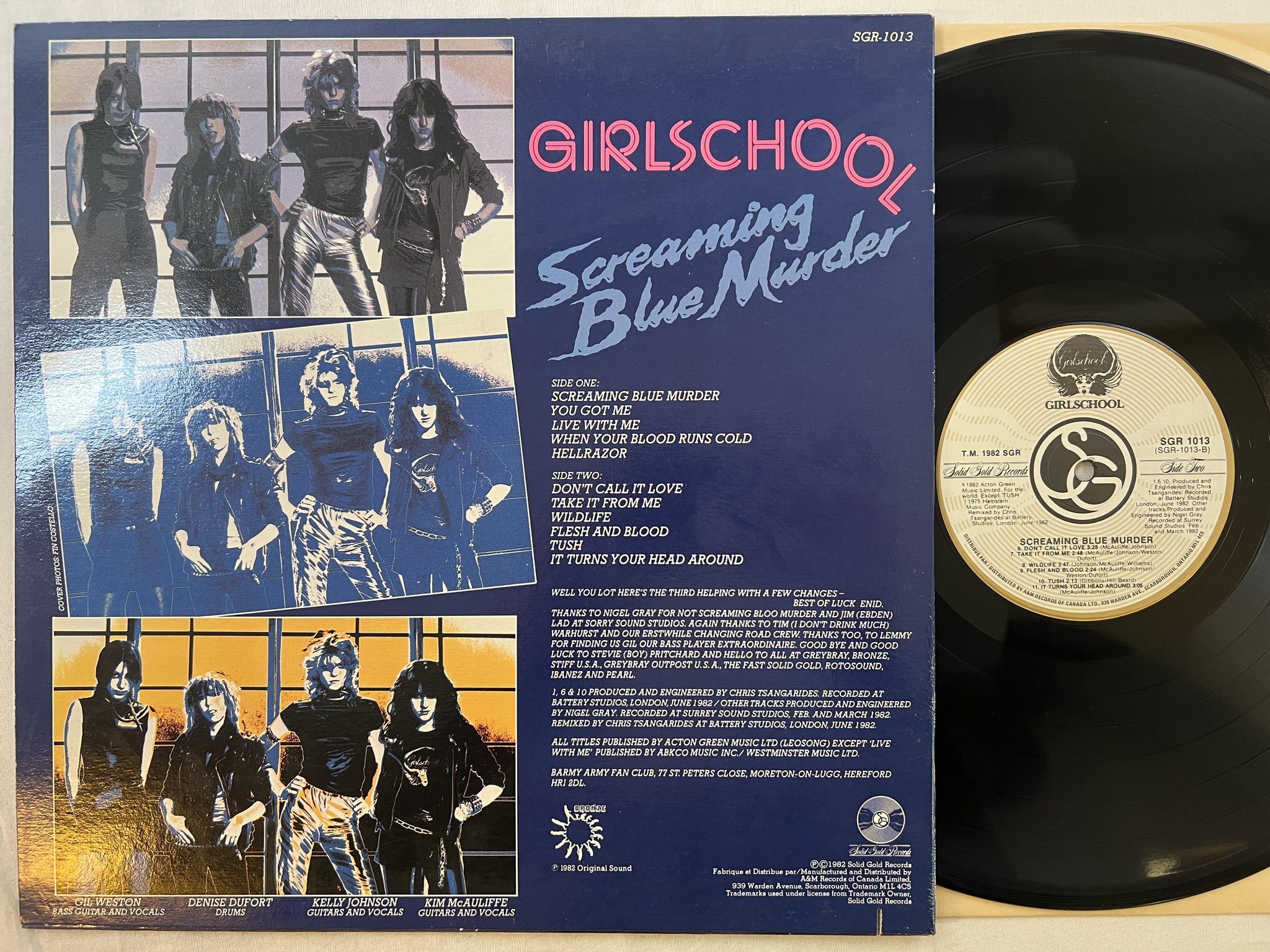 Omslagsbild för skivan GIRLSCHOOL screaming blue murder LP -82 Can SOLID GOLD SGR 1013