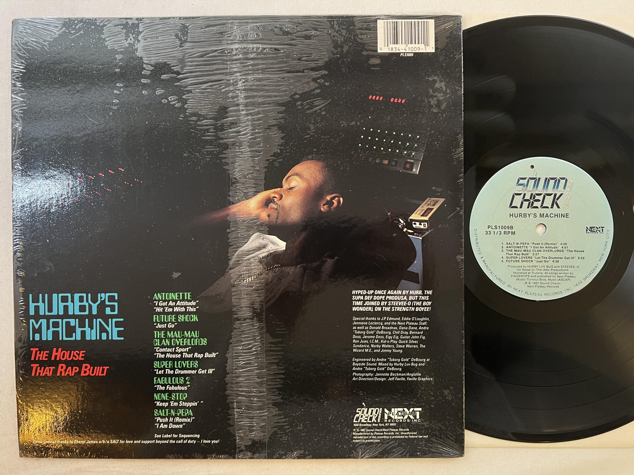 Omslagsbild för skivan HURBY'S MACHINE the house that rap built LP -87 US SOUND CHECK PLS 1009 hype