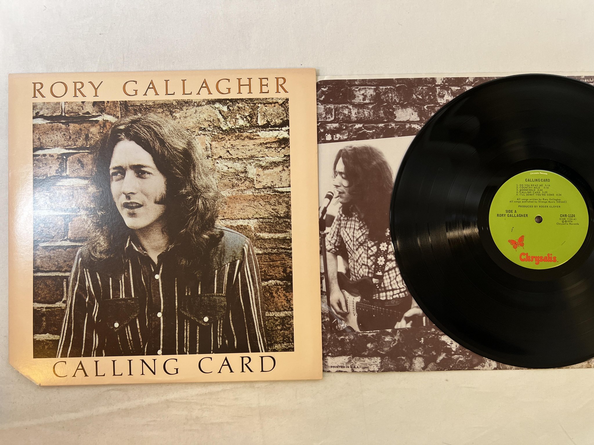 Omslagsbild för skivan RORY GALLAGHER calling card LP -76 US CHRYSALIS CHR 1124
