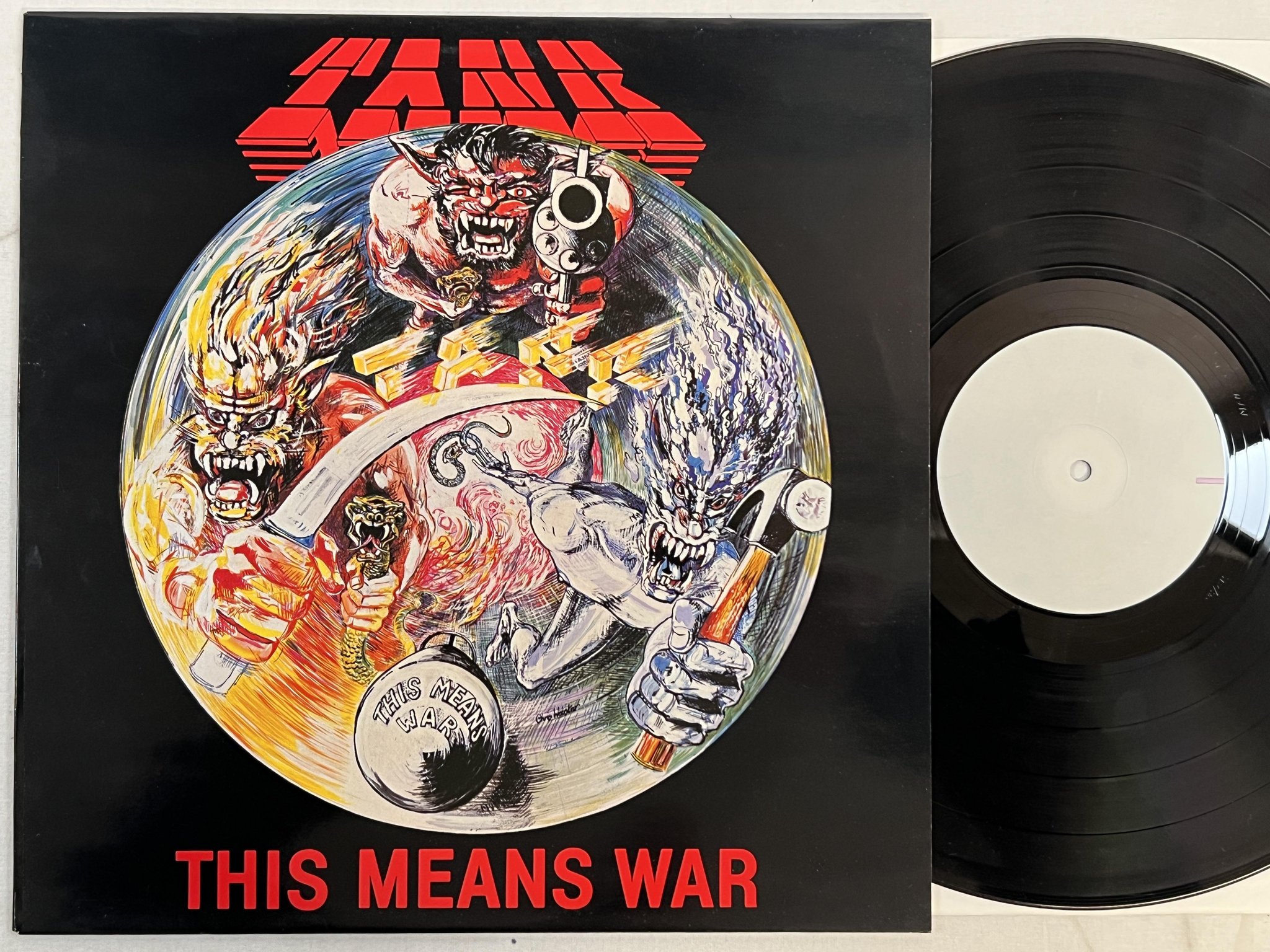 Omslagsbild för skivan TANK This Means War LP -83 ncb WHITE LABEL PROMO SOS MFN 3 ** MEGA RARE **