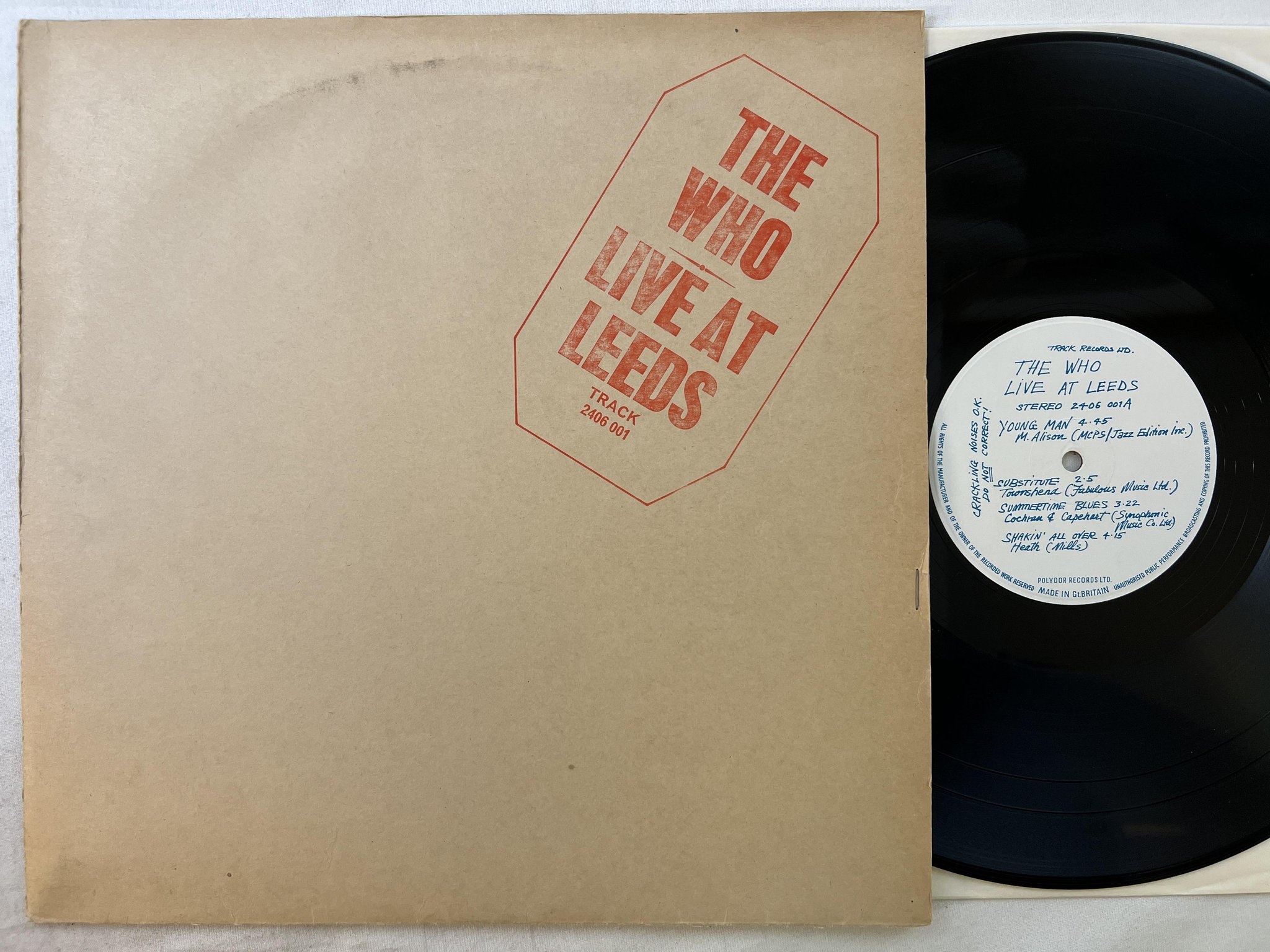 Omslagsbild för skivan THE WHO live at Leeds LP -70 UK TRACK 2406 001 red lettering ** w/ POSTER **
