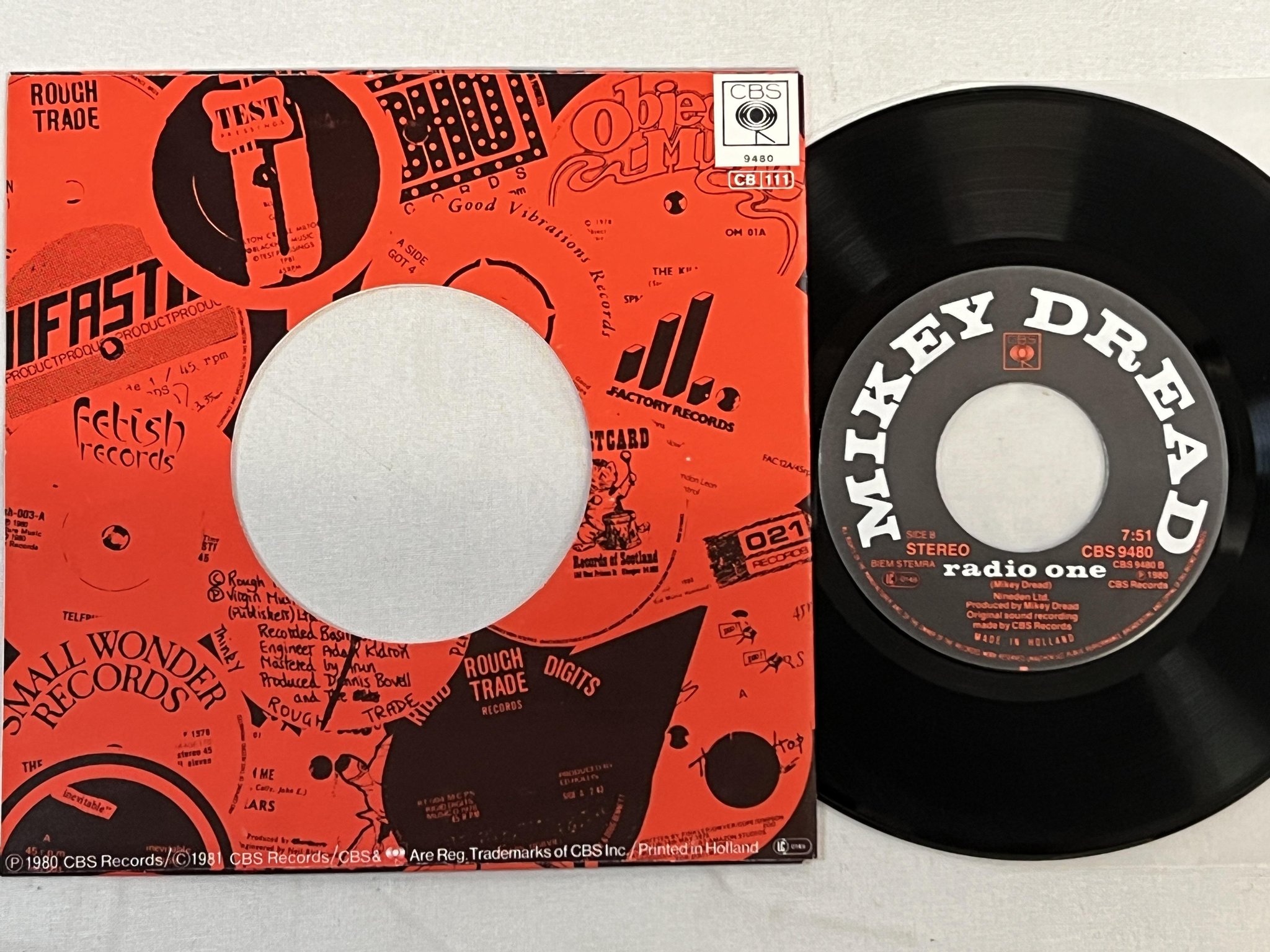 Omslagsbild för skivan THE CLASH hitsville u.k. MICKEY DREAD radio one 7"single -80 UK CBS 9480