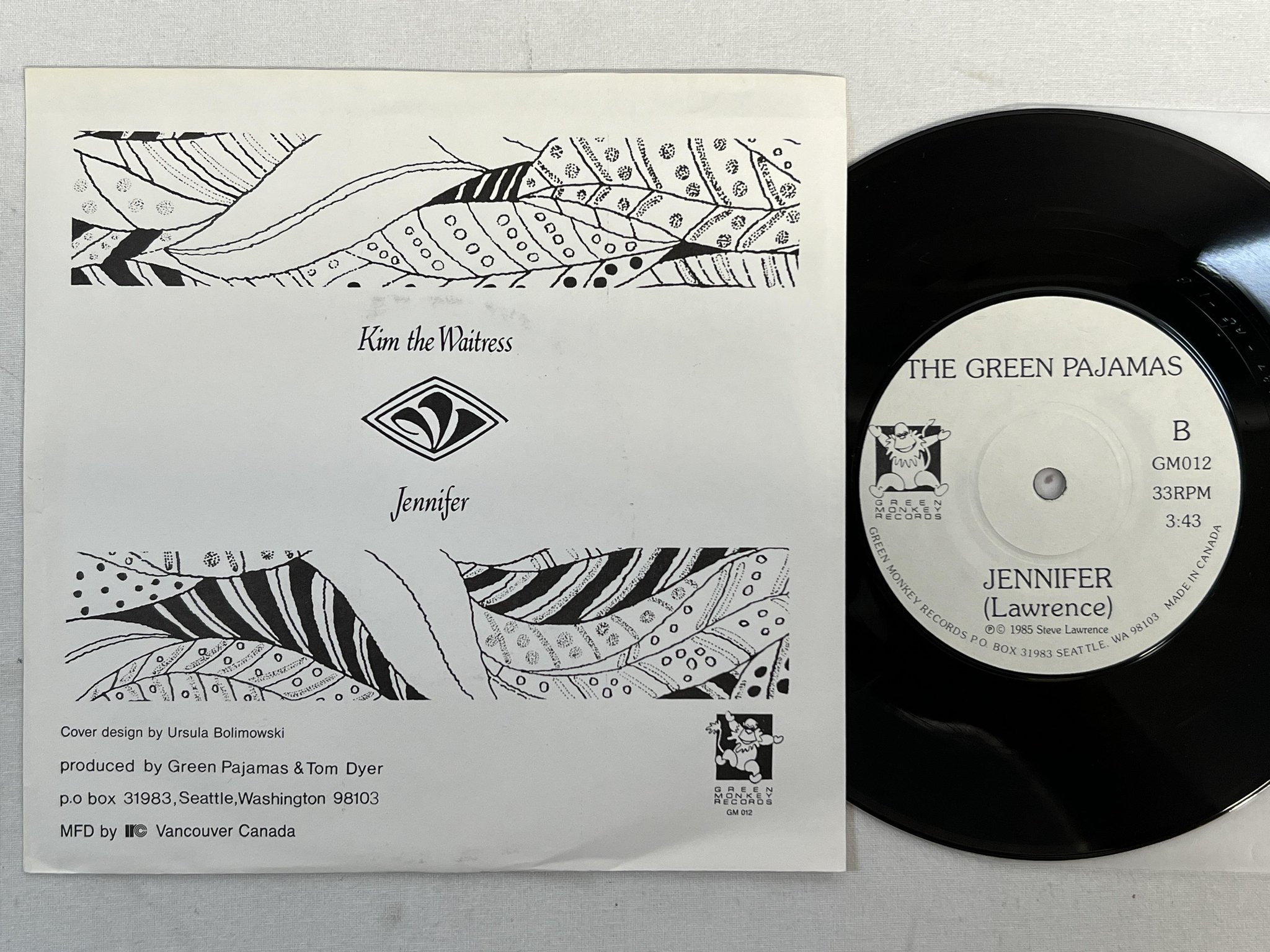 Omslagsbild för skivan THE GREEN PAJAMAS Kim The Waitress 7"single -86 US GREEN MONKEY GM012