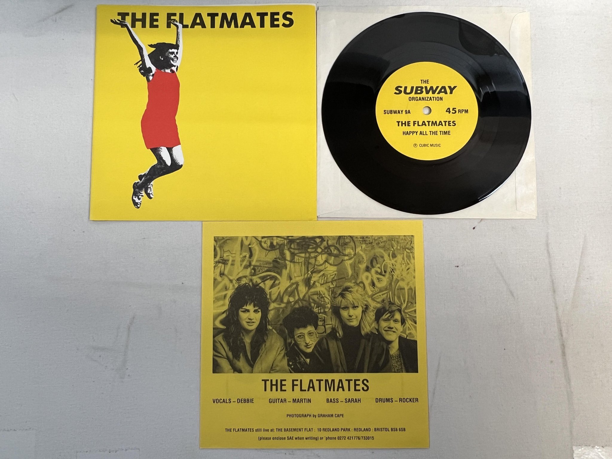 Omslagsbild för skivan THE FLATMATES Happy All The Time 7" -87 UK SUBWAY 9 ** INDIE POP **