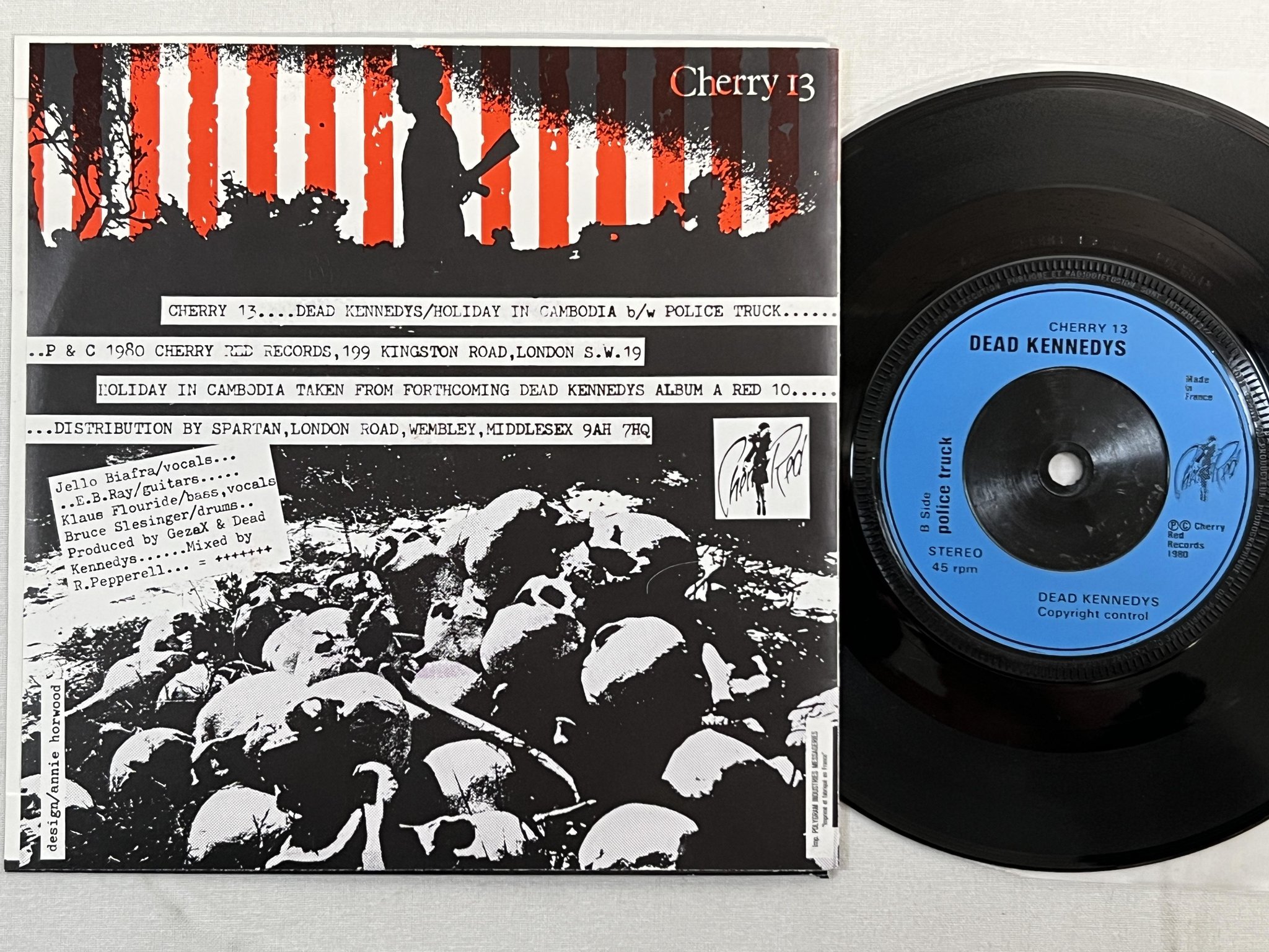 Omslagsbild för skivan DEAD KENNEDYS holiday in Cambodia 7" -80 CHERRY 13 ** Airplane Cover **