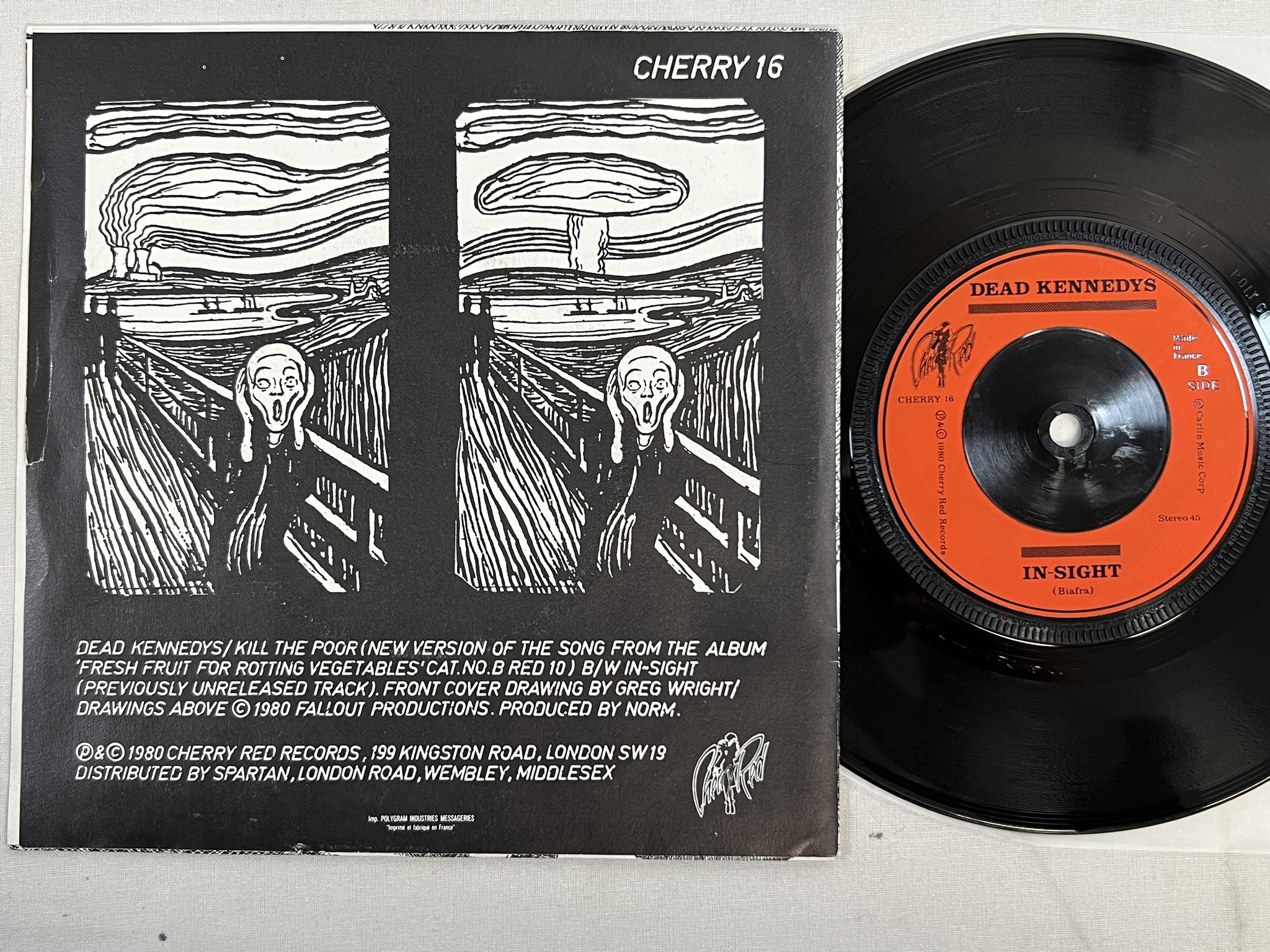 Omslagsbild för skivan DEAD KENNEDYS Kill The Poor 7" -80 CHERRY RED CHERRY 16