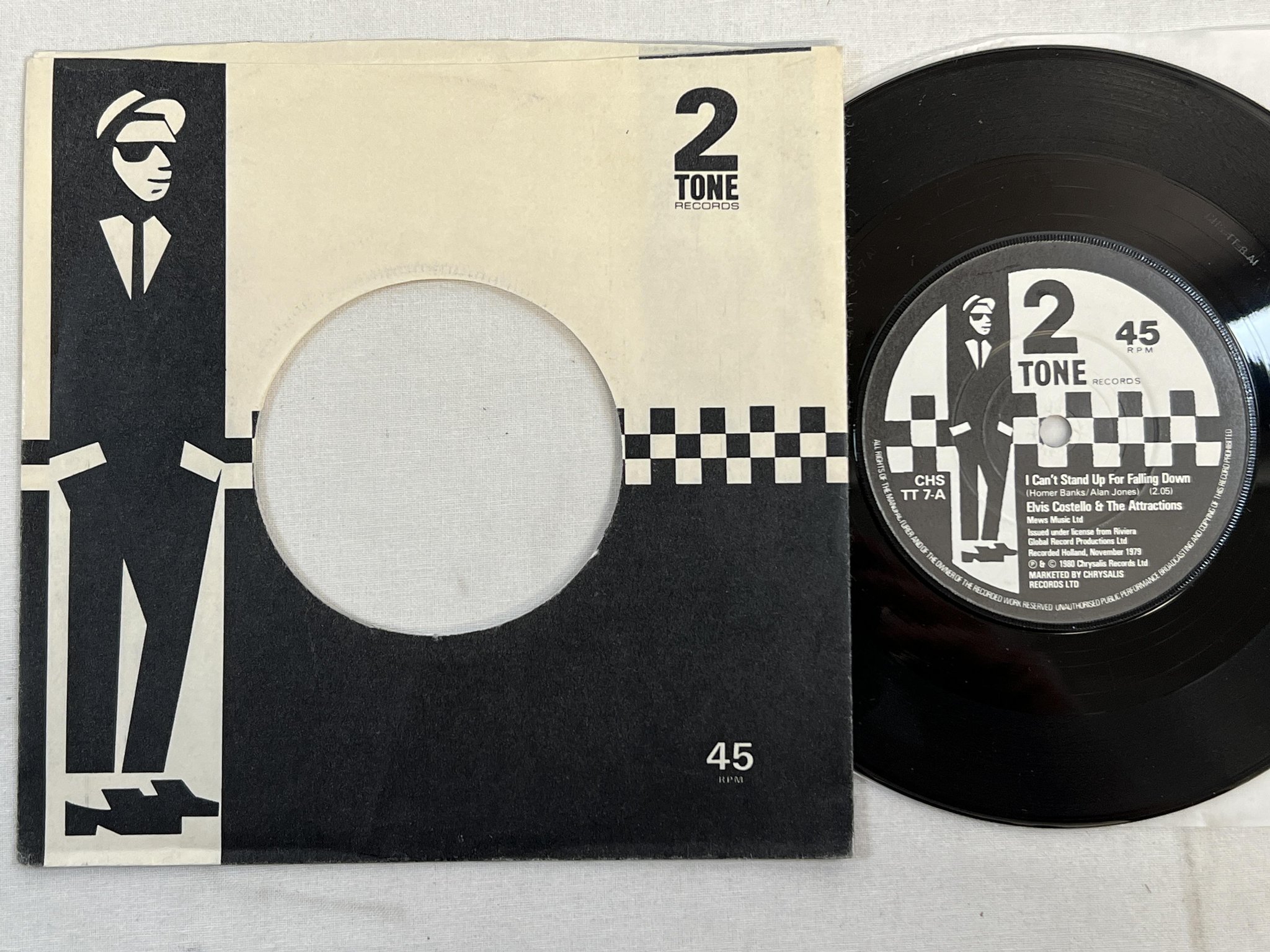 Omslagsbild för skivan ELVIS COSTELLO & THE ATTRACTIONS I Can't Stand Up 7" -80 UK TWO-TONE **RARE**