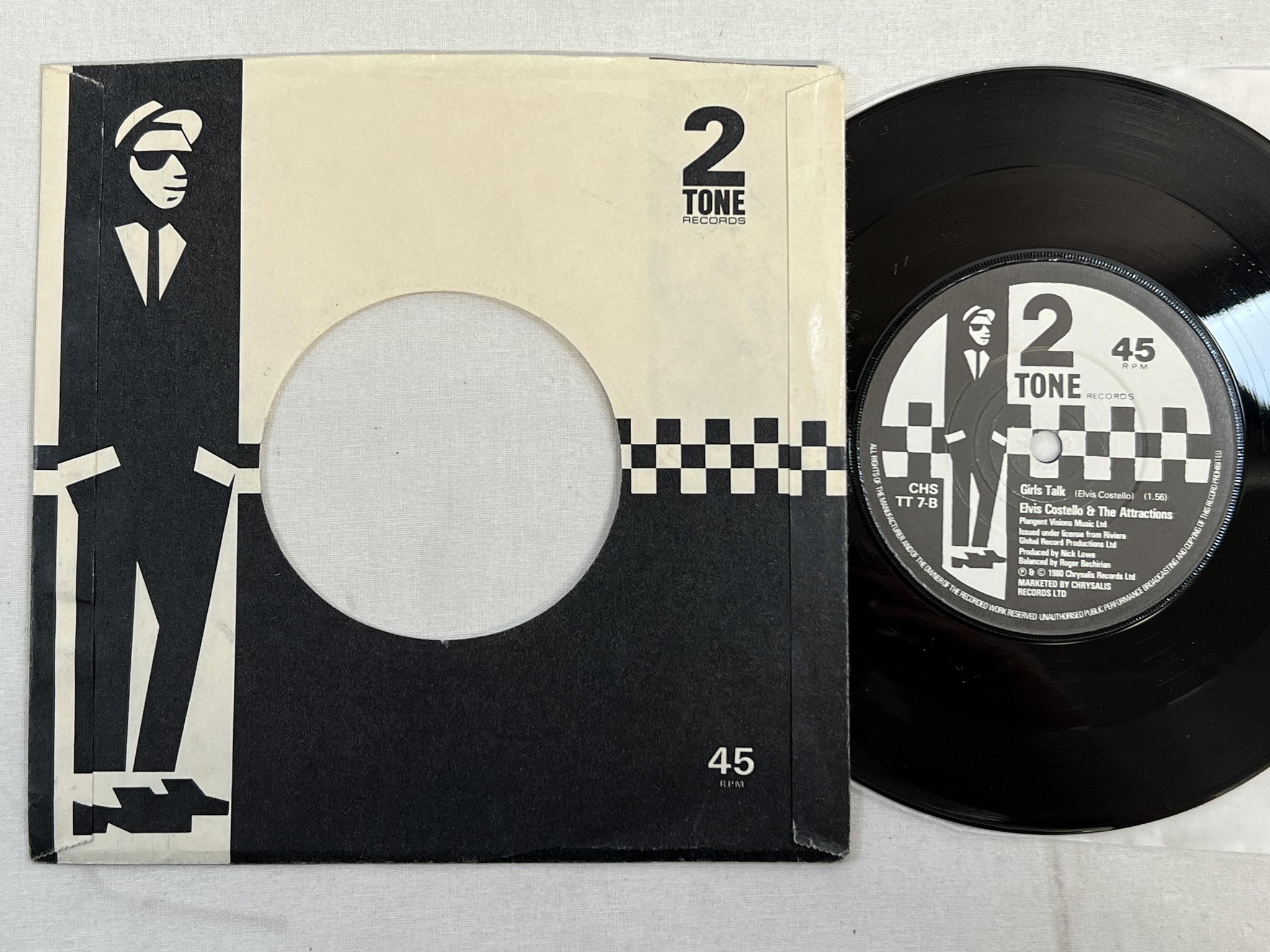 Omslagsbild för skivan ELVIS COSTELLO & THE ATTRACTIONS I Can't Stand Up 7" -80 UK TWO-TONE **RARE**