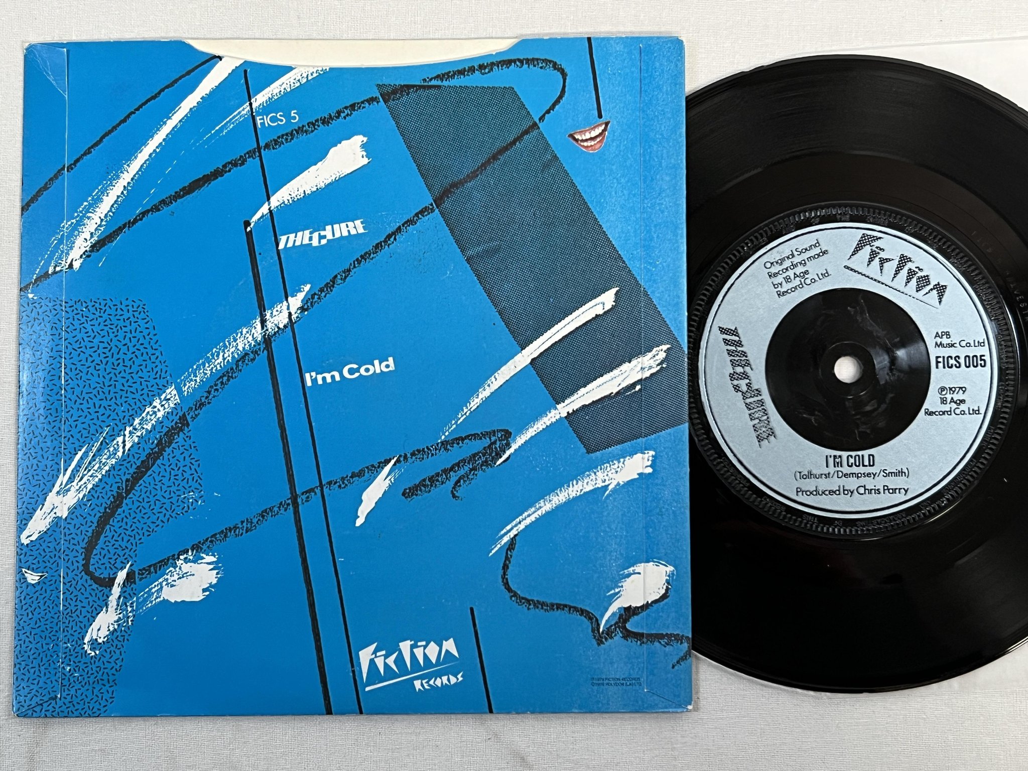 Omslagsbild för skivan THE CURE Jumping Someone Else's Train 7" -79 UK FICTION FICS 005