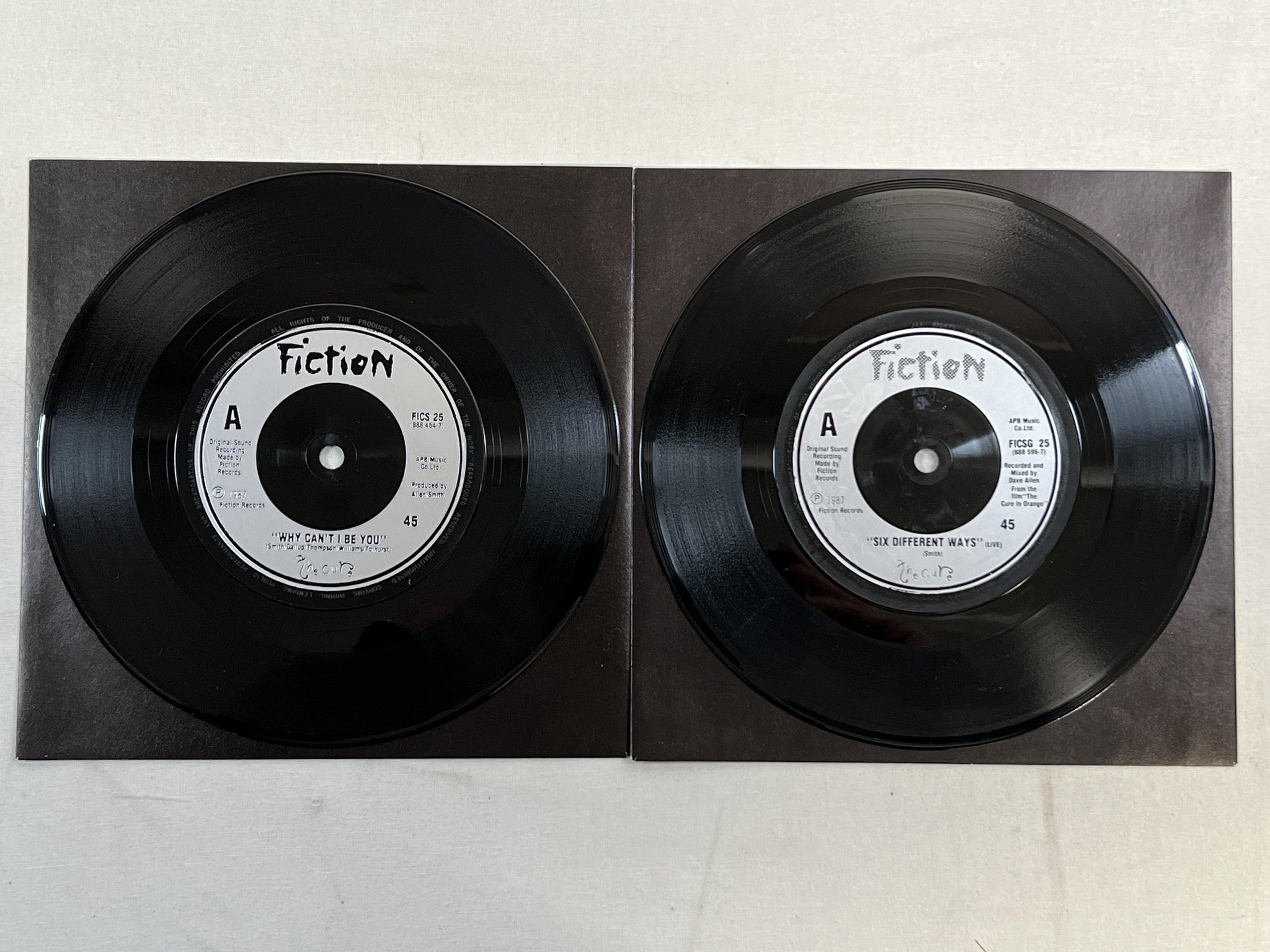 Omslagsbild för skivan THE CURE Why Can't I Be You? 2x7" -87 UK FICTION FICS G 25 #07657