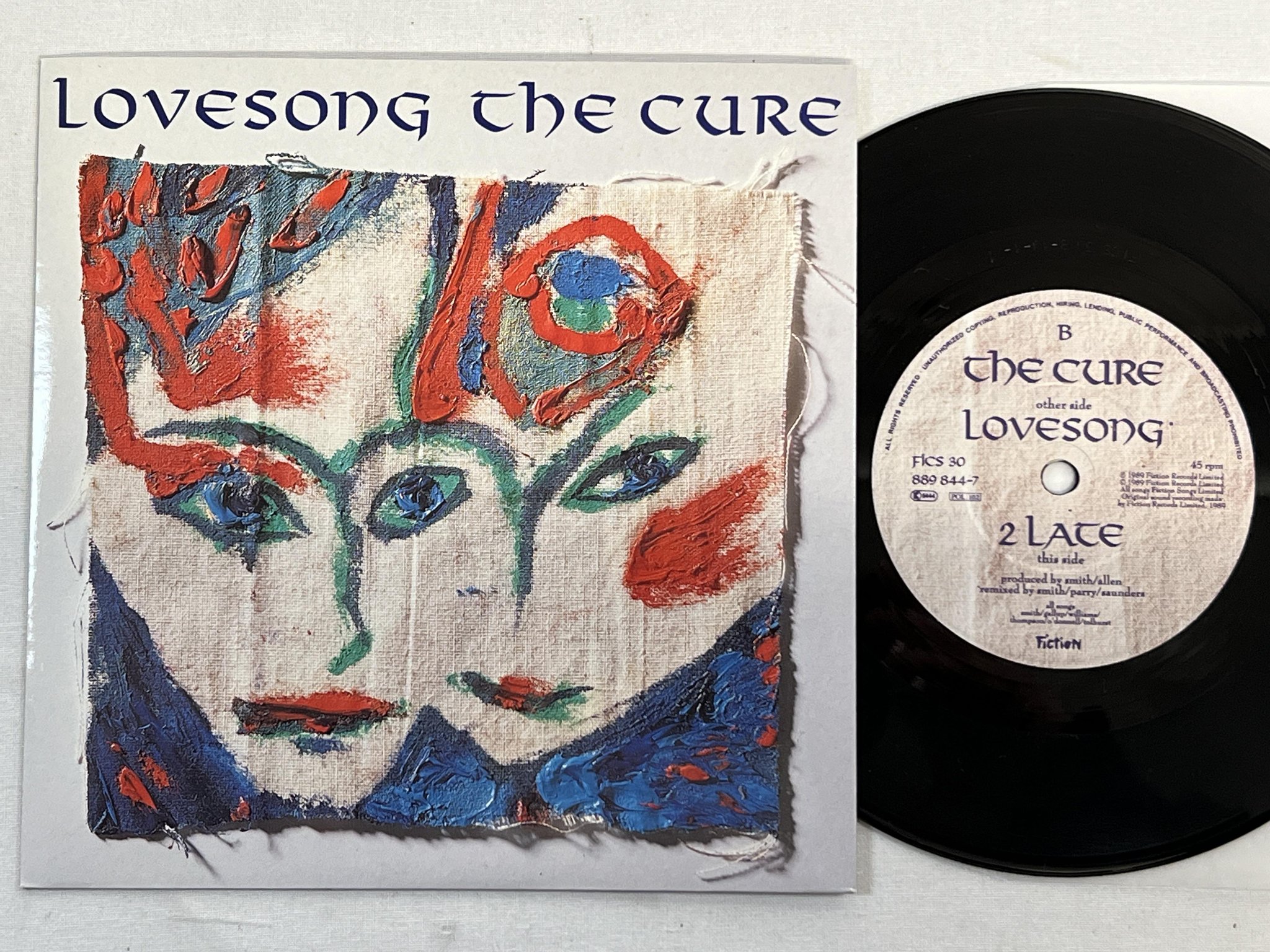 Omslagsbild för skivan THE CURE Lovesong 7" -89 FICTION FICS 30