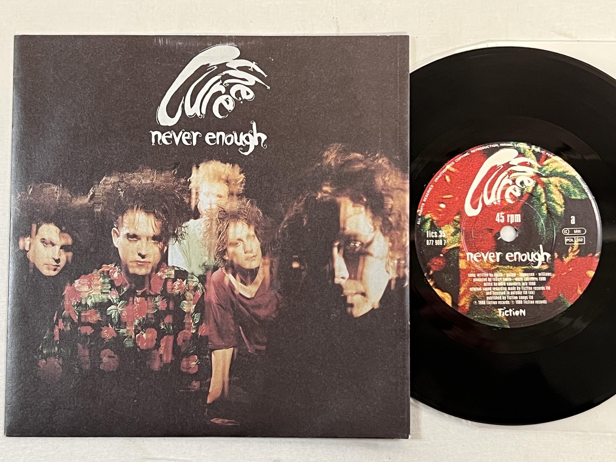 Omslagsbild för skivan THE CURE Never Enough 7" -90 FICTION FICS 35