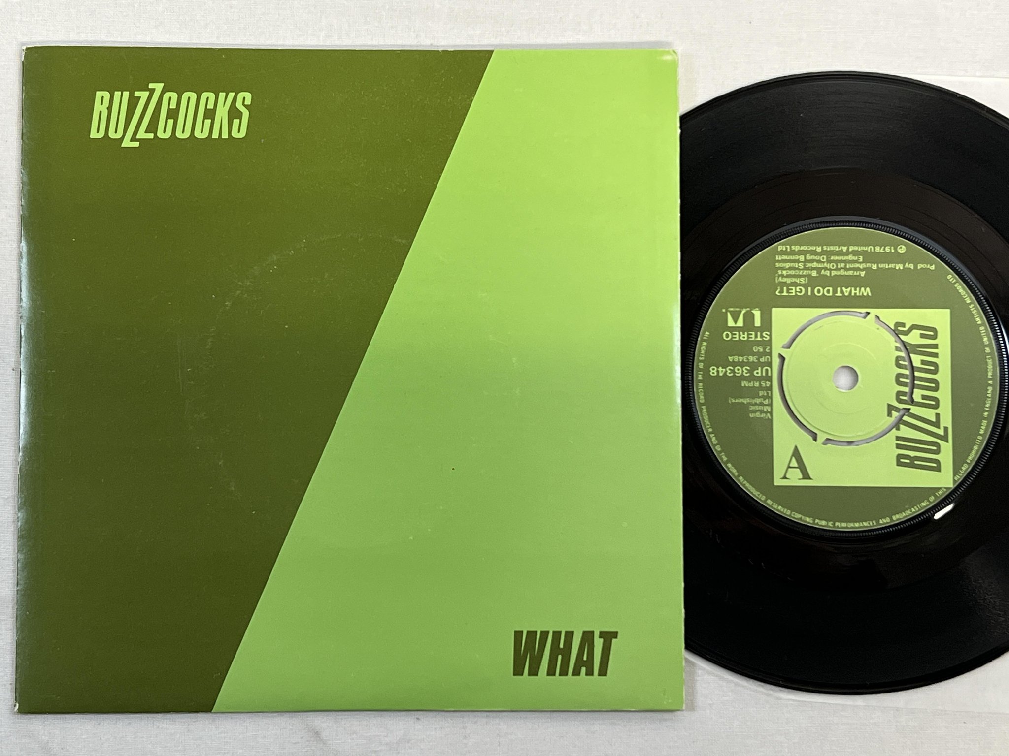 Omslagsbild för skivan BUZZCOCKS What Do I Get? 7" -78 UK UNITED UP 36348
