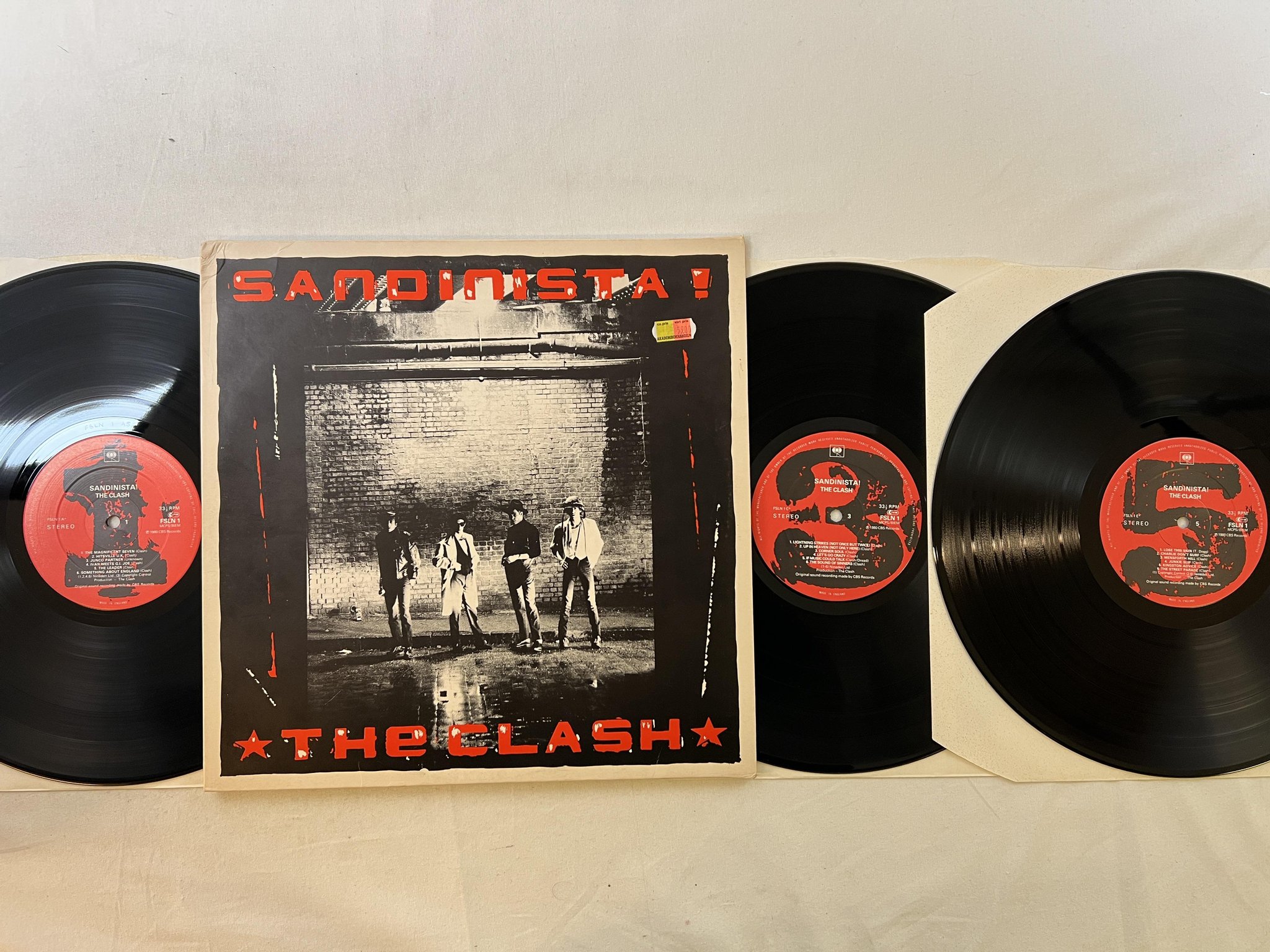 Omslagsbild för skivan THE CLASH sandinista! 3xLP -80 UK CBS FSLN 1