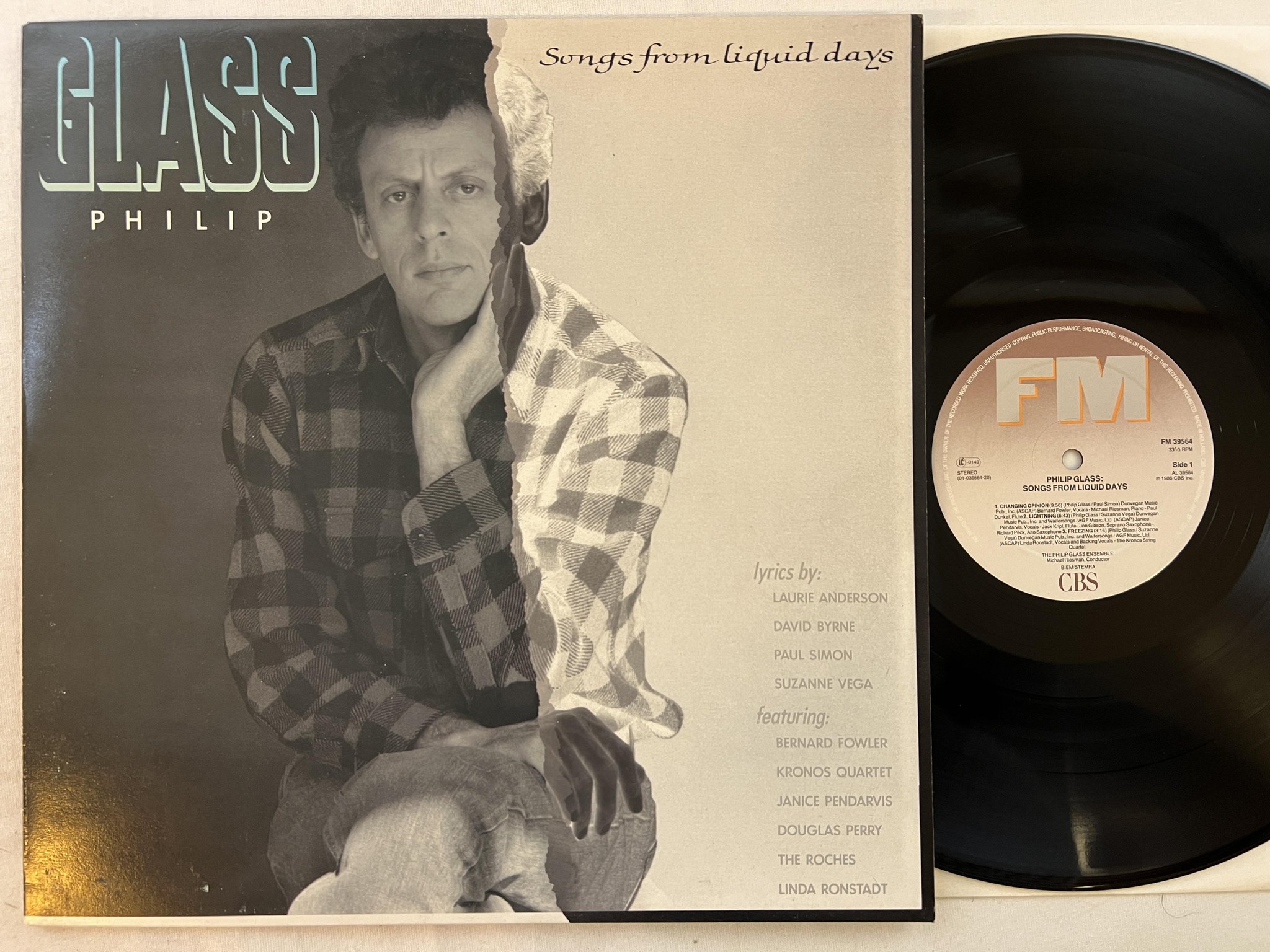 Omslagsbild för skivan PHILIP GLASS songs from liquid days LP -86 Hol FM 39564