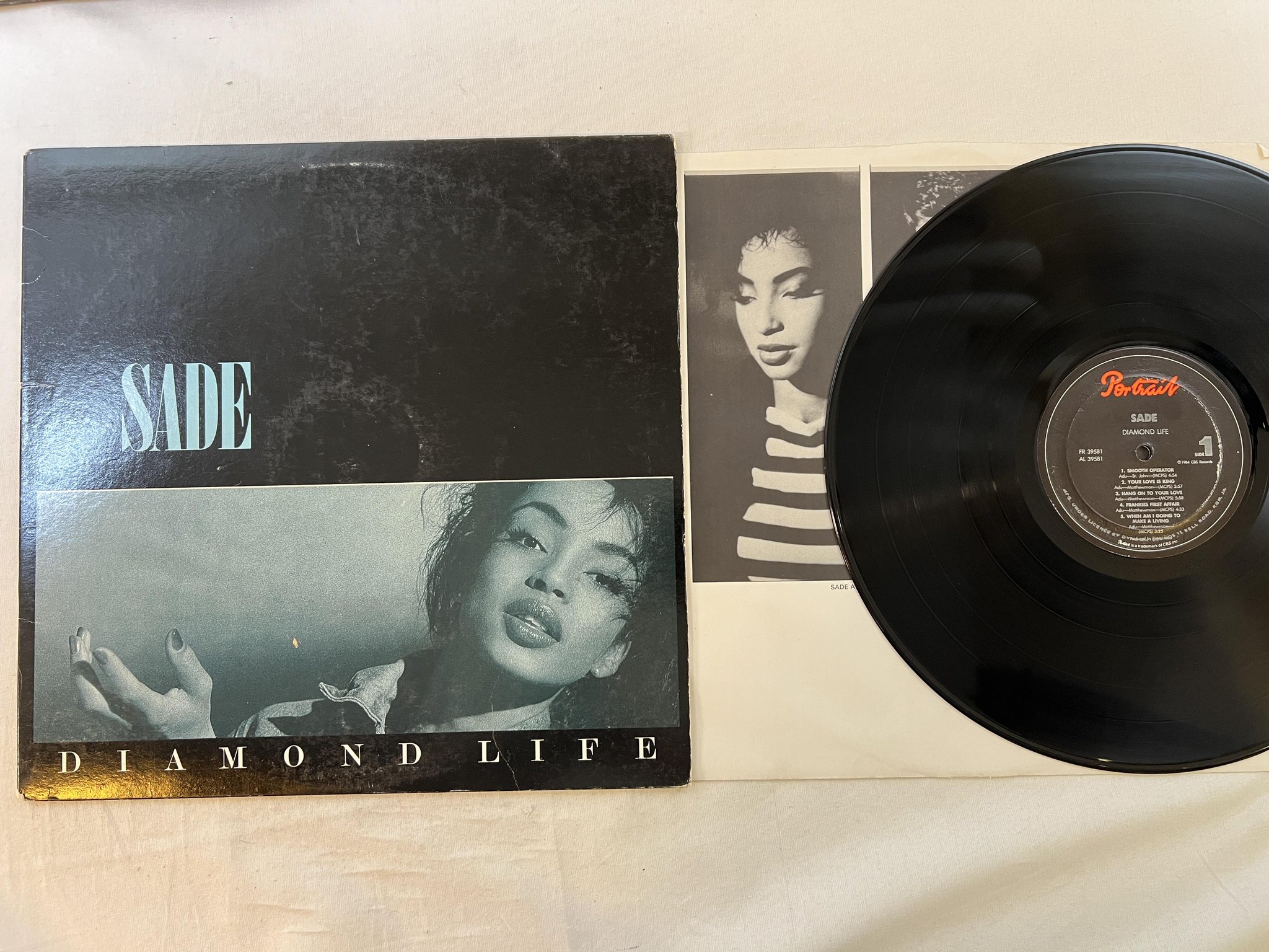 Omslagsbild för skivan SADE diamond life LP -84 Jam PORTRAIT FR 39581 ** rare jamaican pressing **