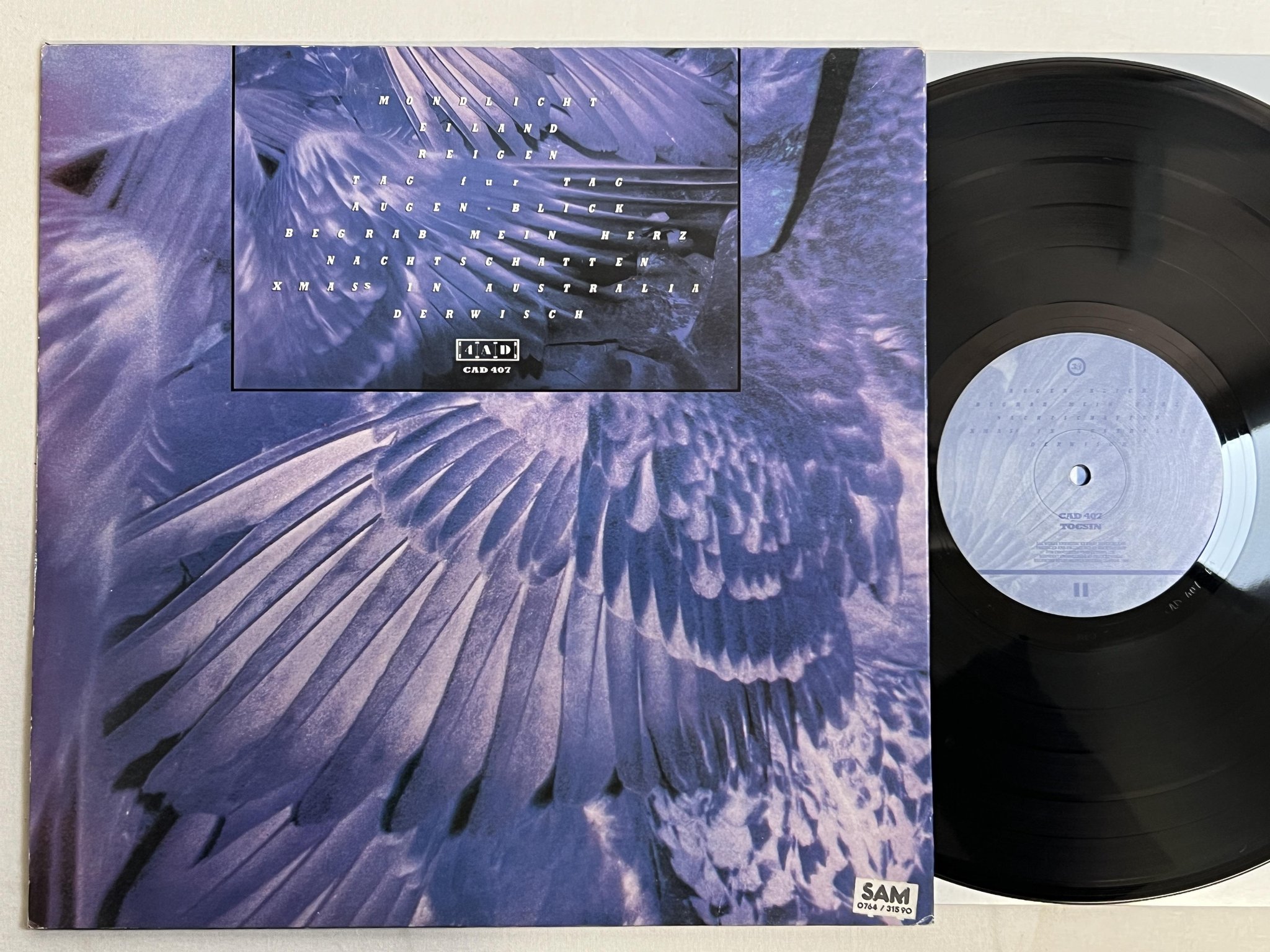 Omslagsbild för skivan X MAL DEUTSCHLAND Tocsin LP -84 UK 4AD CAD 407 ** GOTH ROCK **