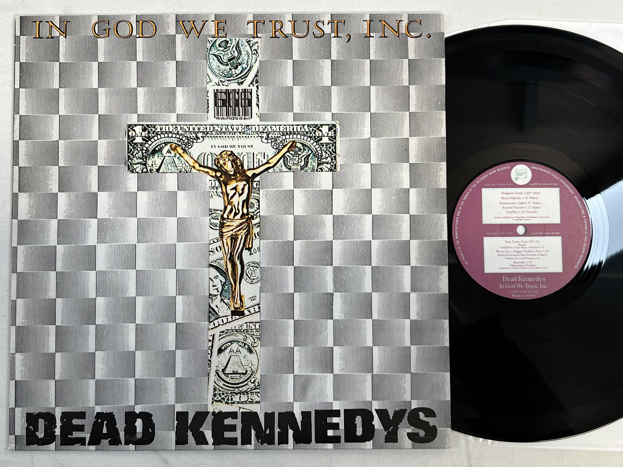 Omslagsbild för skivan DEAD KENNEDYS In God We Trust, Inc. 12"EP -81 UK STATIK STAT EP2 ** punk **