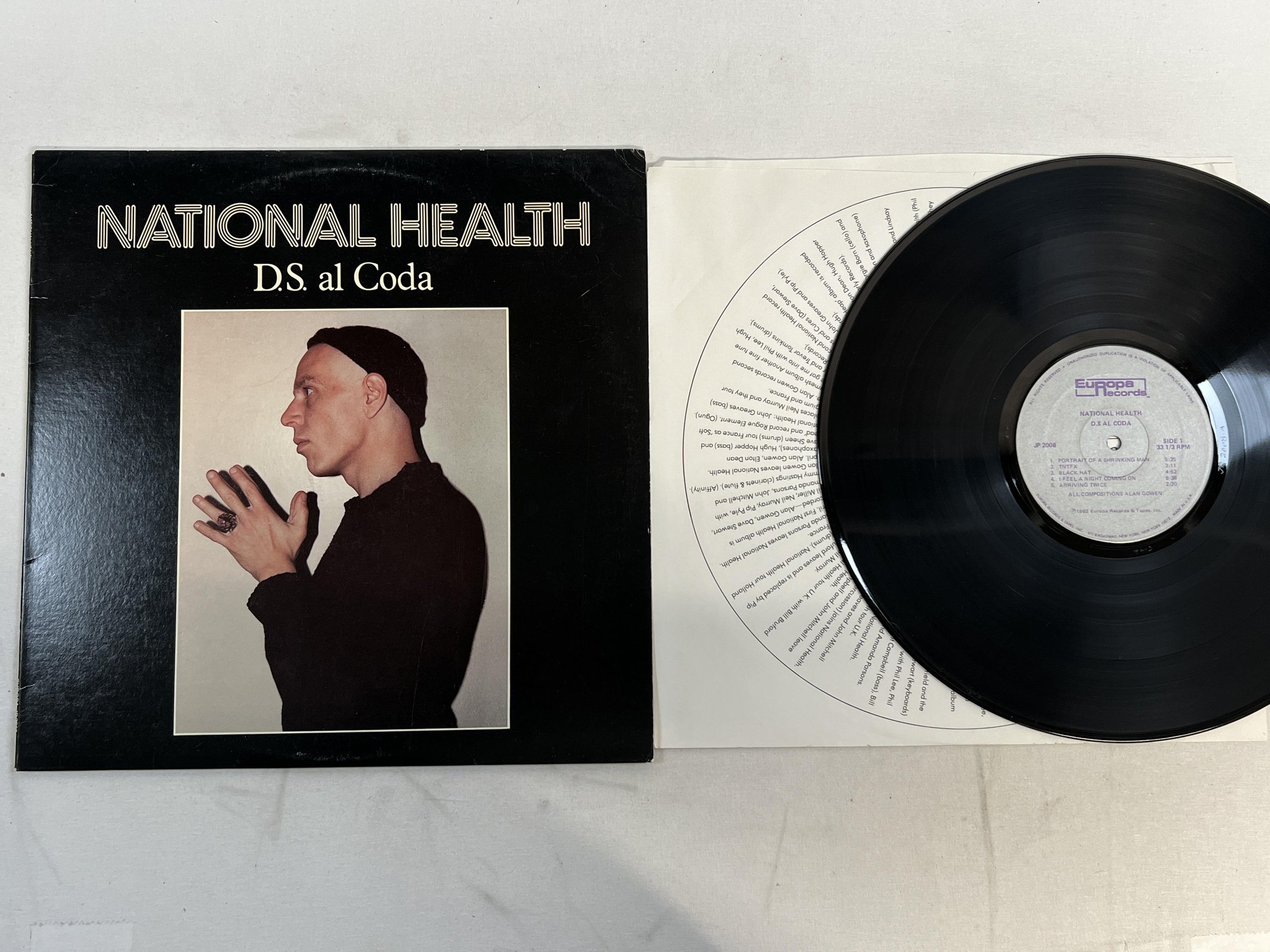 Omslagsbild för skivan NATIONAL HEALTH d.s. al coda LP -82 EUROPA JP2008 ** art rock / jazz **