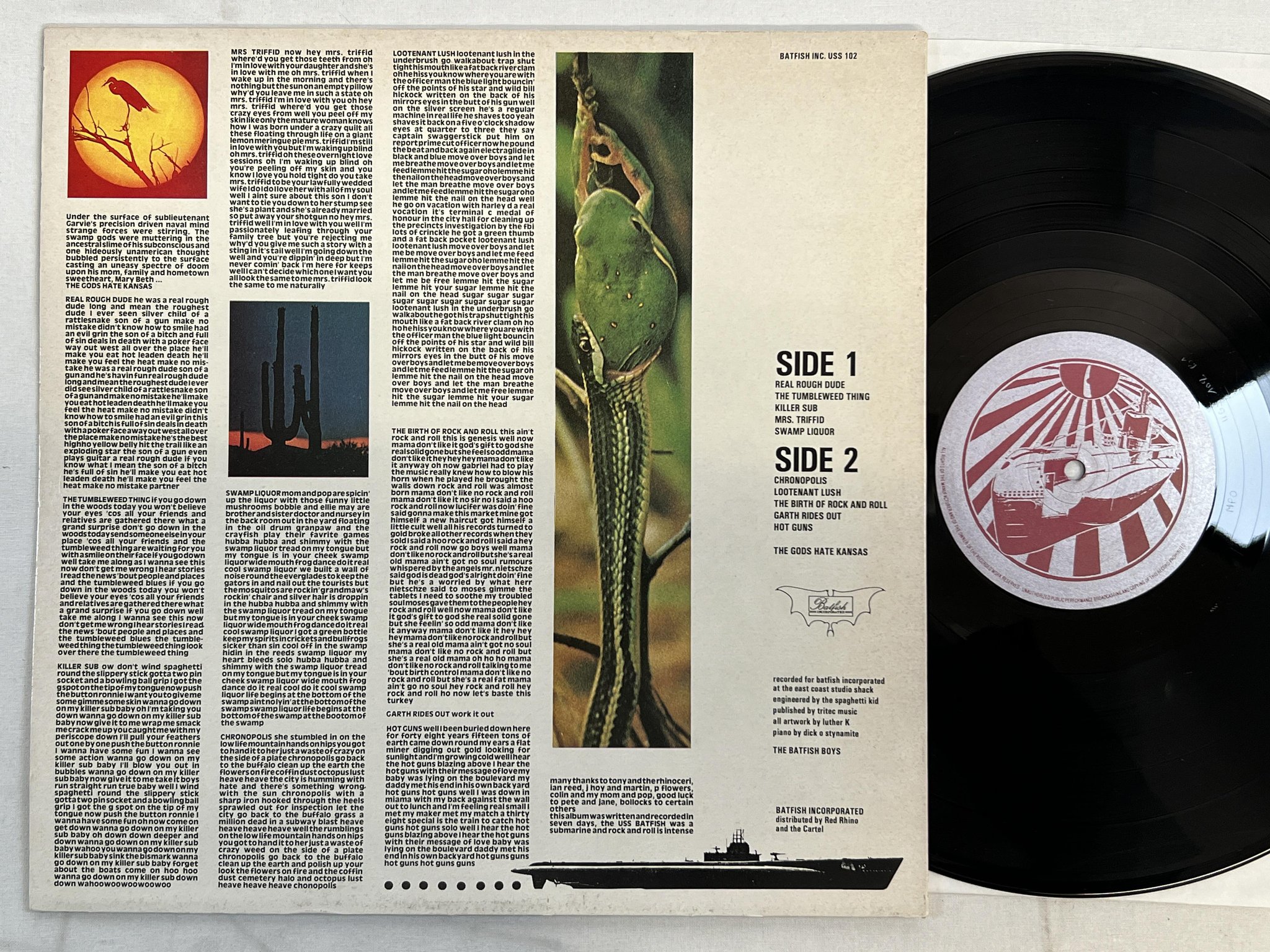 Omslagsbild för skivan THE BATFISH BOYS the gods hate kansas LP -85 UK USS 102 ** GOTH / NEW WAVE **