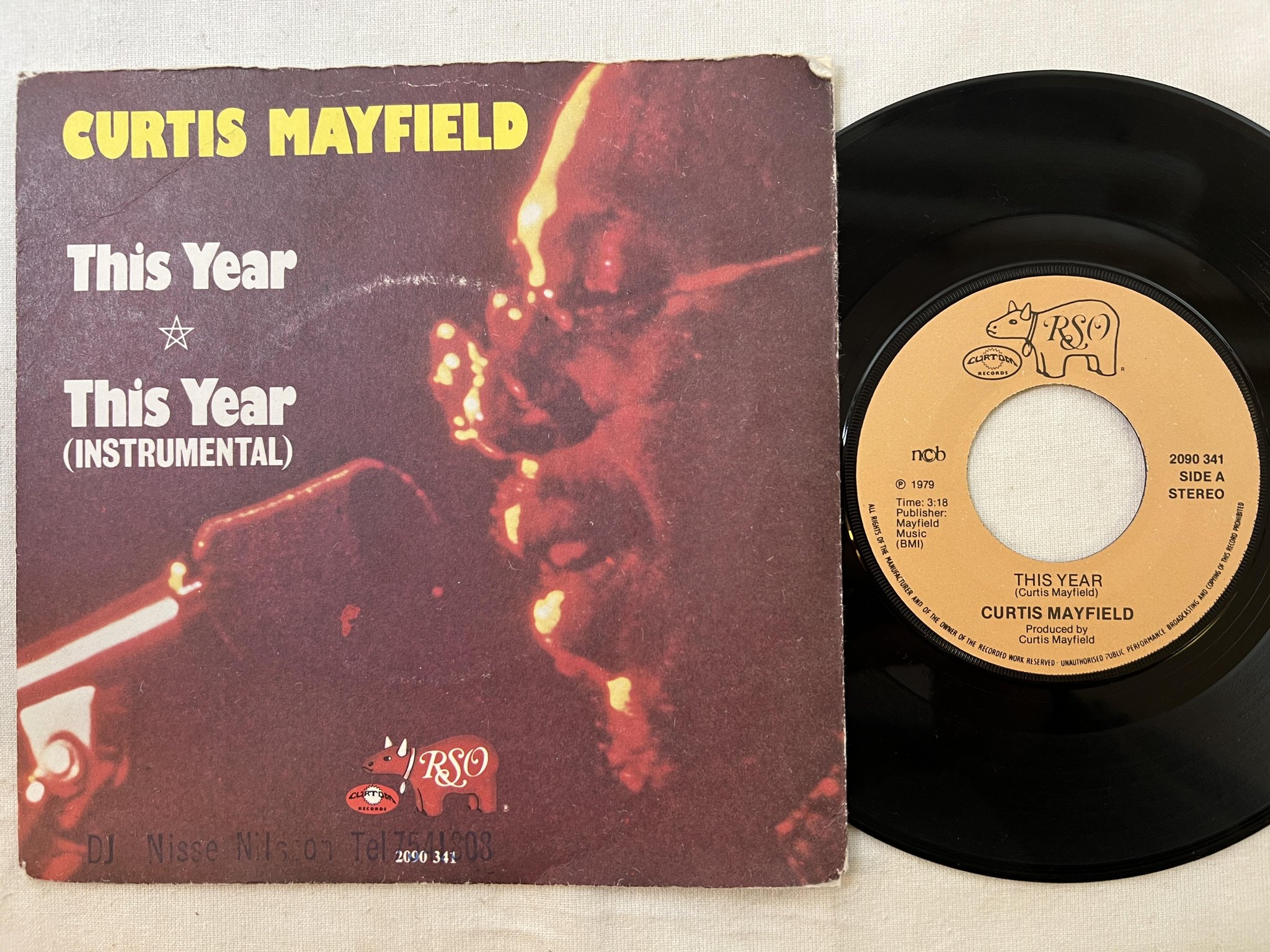 Omslagsbild för skivan CURTIS MAYFIELD this year 7" -79 NCB rso 2090341