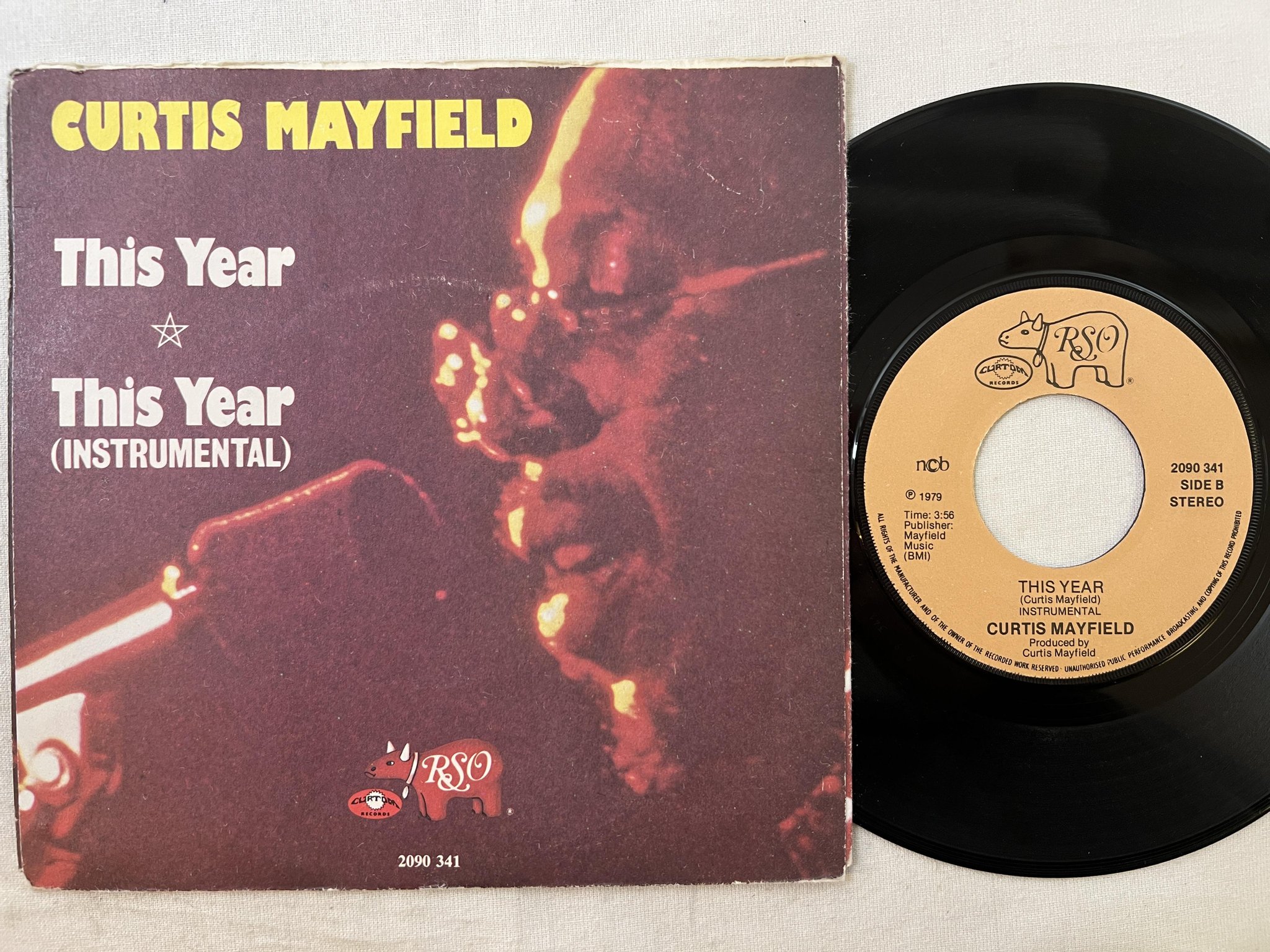 Omslagsbild för skivan CURTIS MAYFIELD this year 7" -79 NCB rso 2090341