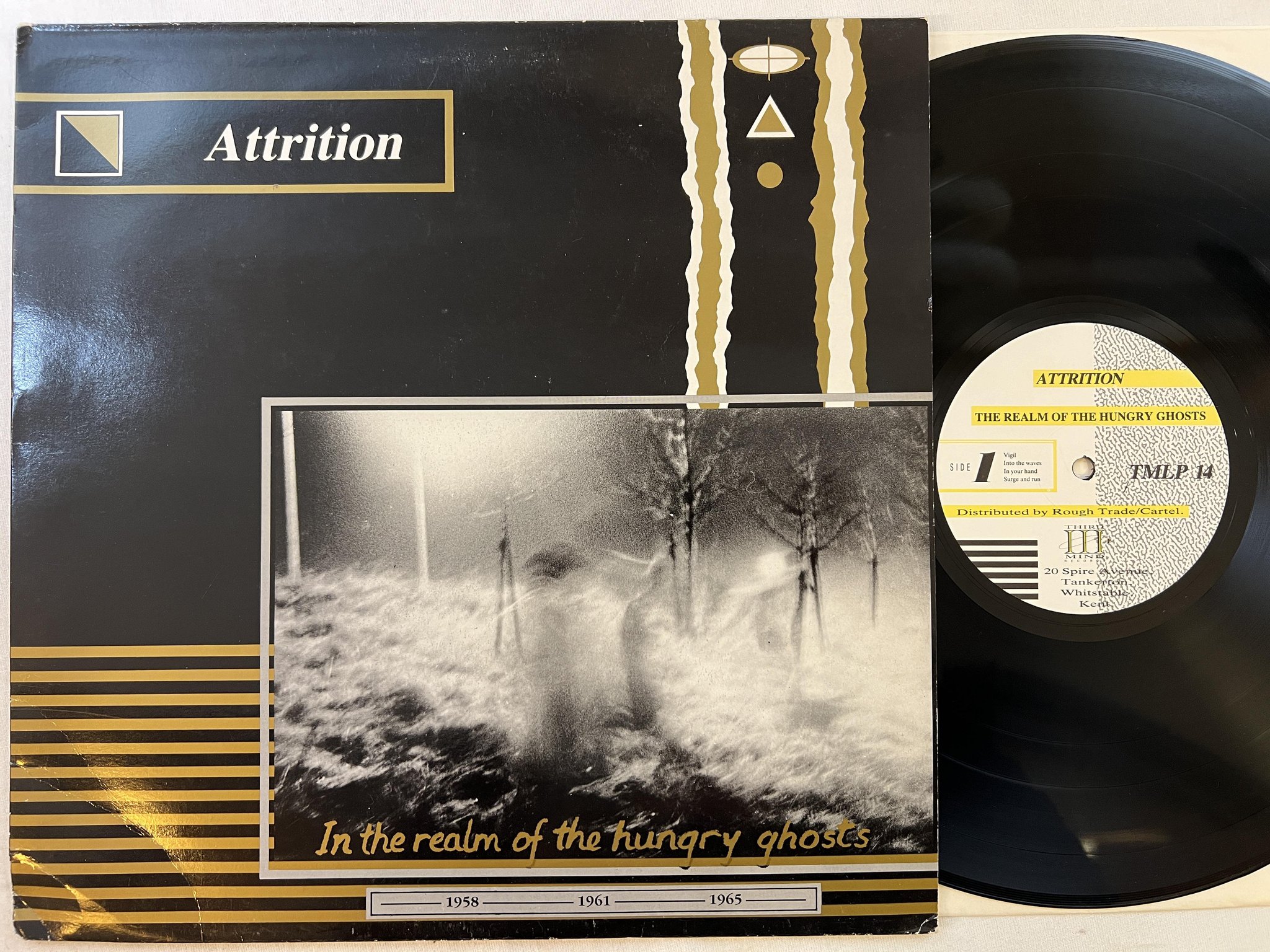 Omslagsbild för skivan ATTRITION the realm of hungry ghosts LP -86 UK THAT MIND TMLP 14