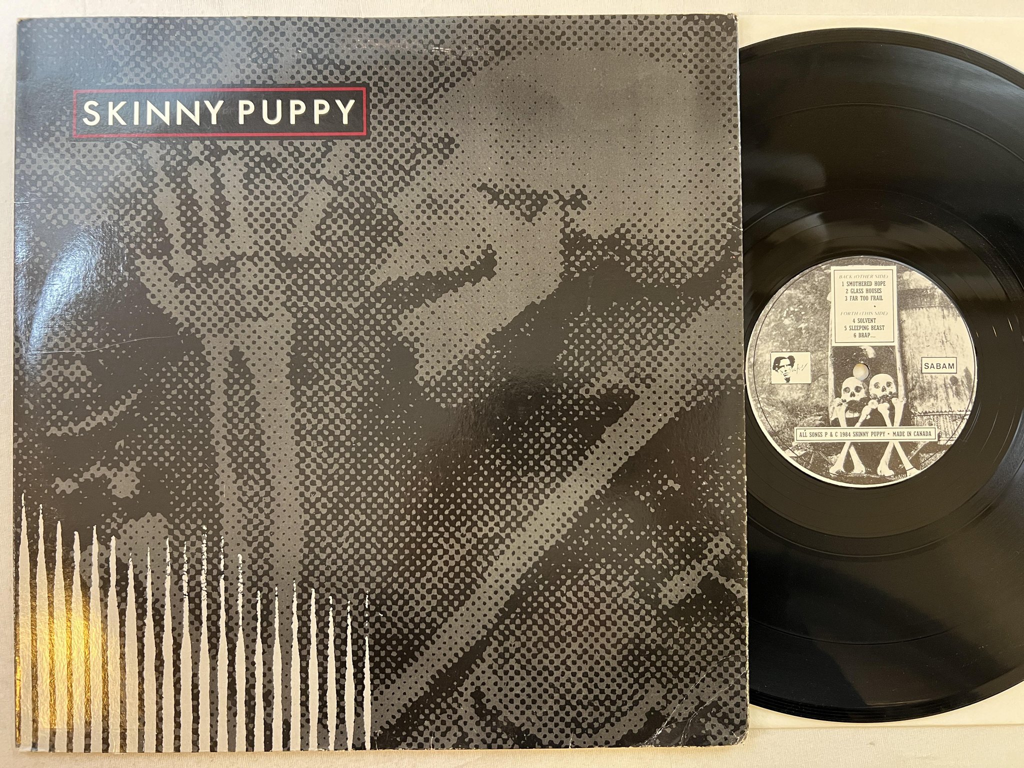 Omslagsbild för skivan SKINNY PUPPY Remission 12" -84 Belgium SCARFACE M face 10