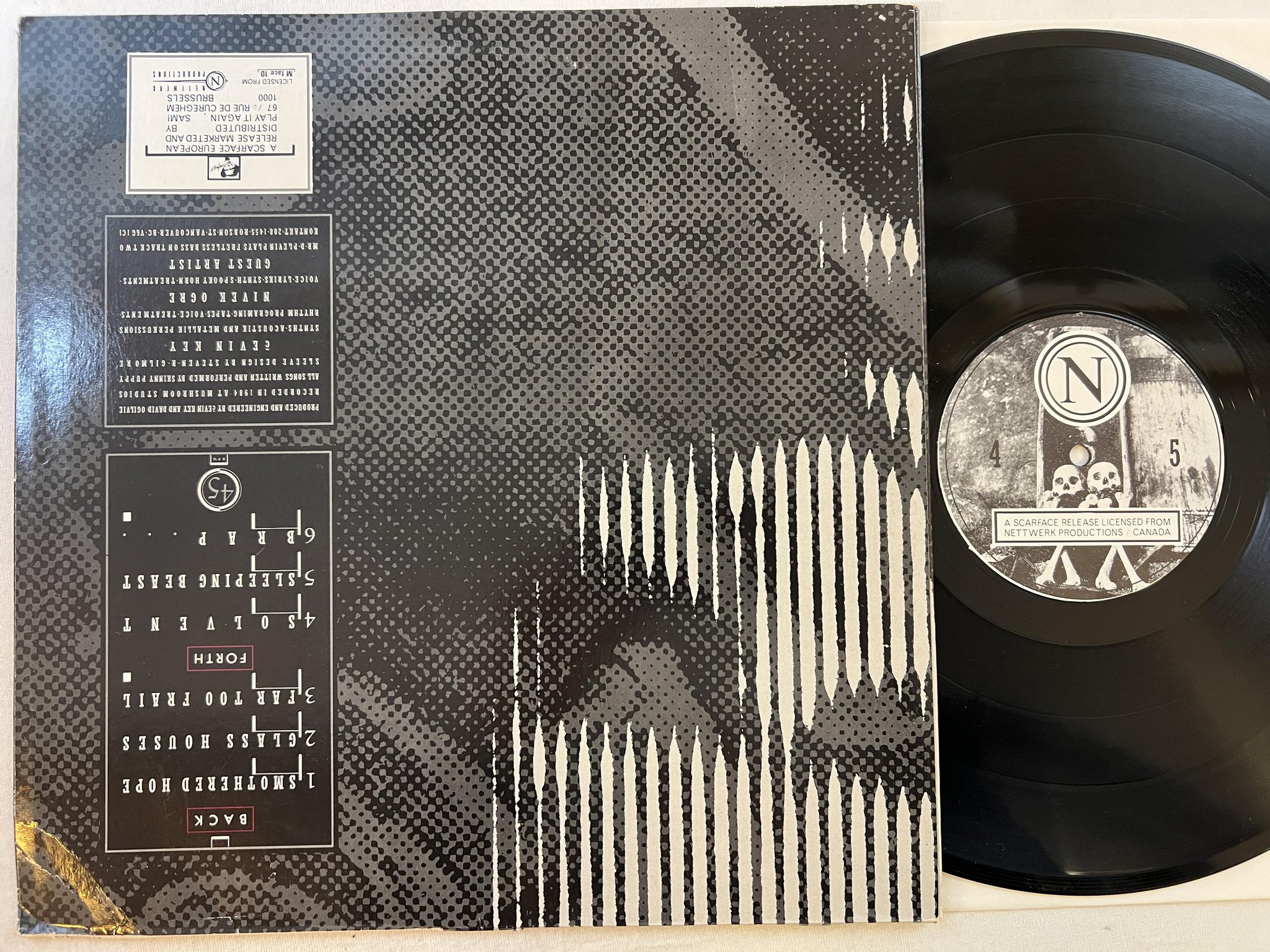 Omslagsbild för skivan SKINNY PUPPY Remission 12" -84 Belgium SCARFACE M face 10