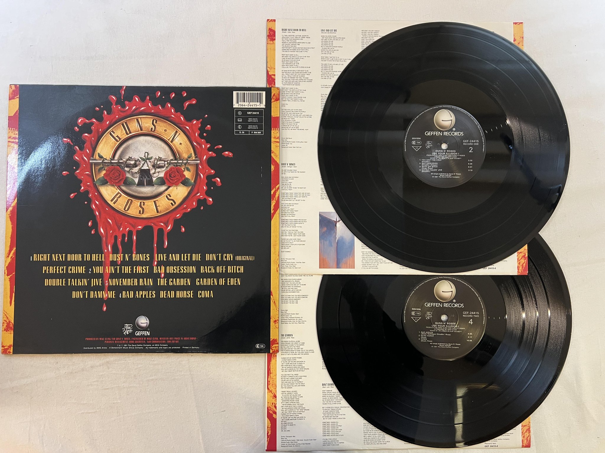 Omslagsbild för skivan GUNS N ROSES use your illusion I LP -91 Ger GEFFEN GEF-24415 ** CLASSIC **