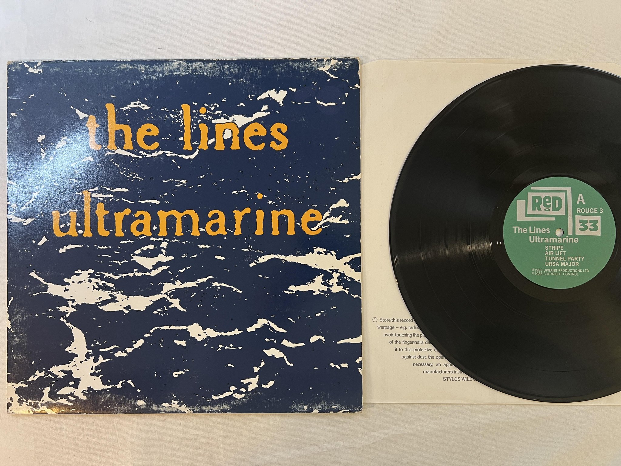 Omslagsbild för skivan THE LINES Ultramarine LP -83 UK RED ROUGH 3 ** post punk **