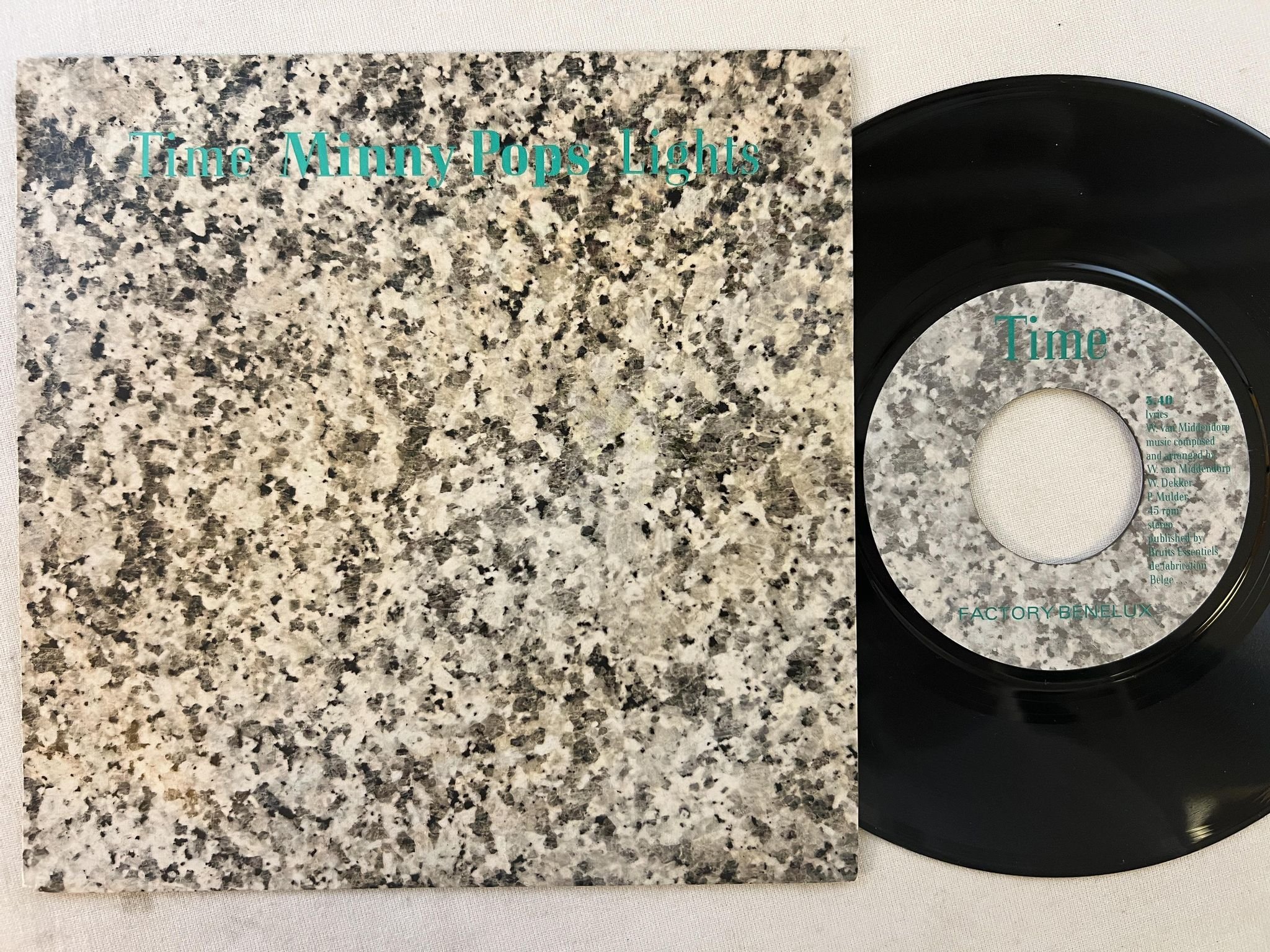 Omslagsbild för skivan MINNY POPS Time 7"single -82 FACTORY BENELUX FAC BN 11
