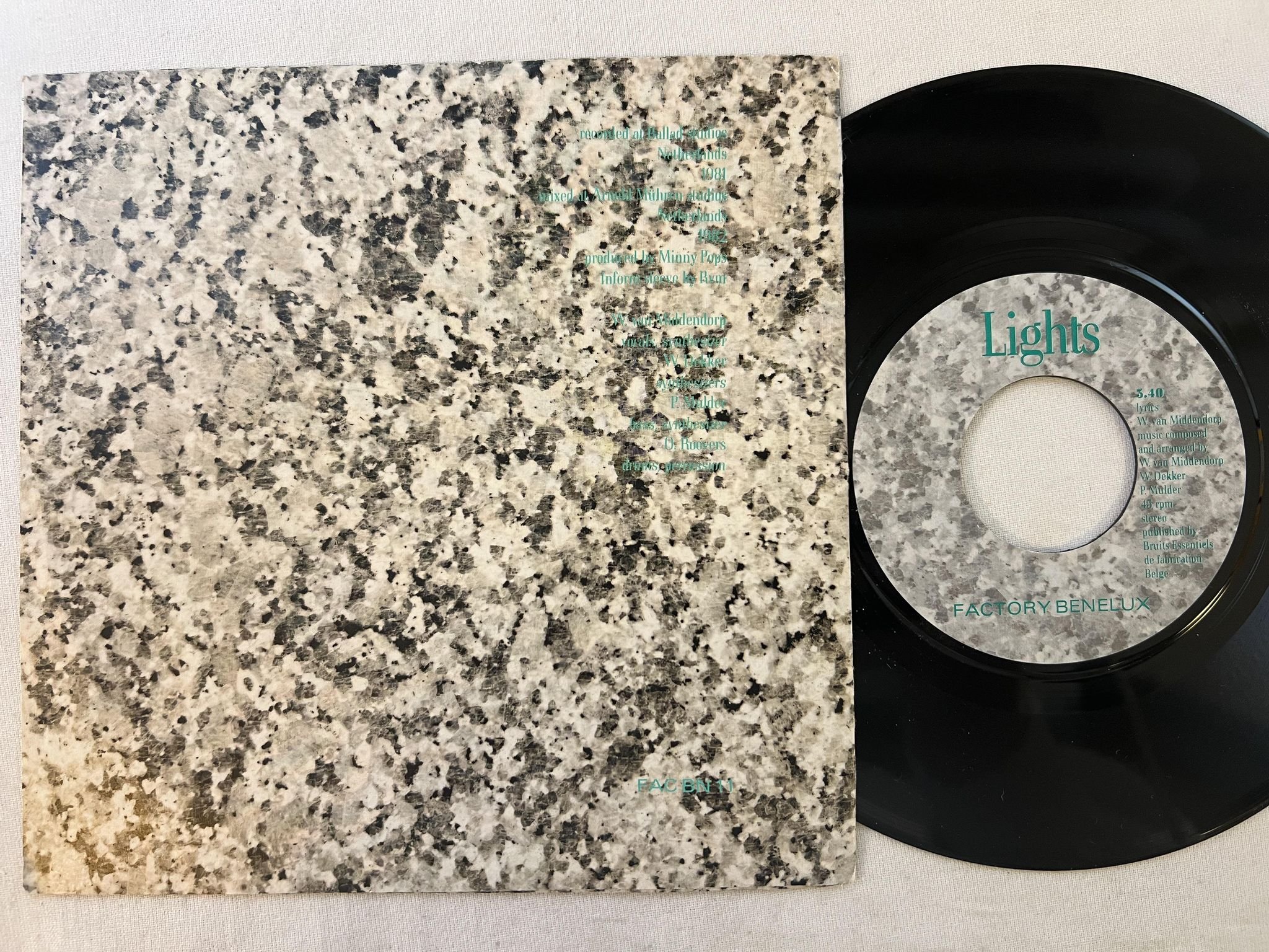 Omslagsbild för skivan MINNY POPS Time 7"single -82 FACTORY BENELUX FAC BN 11