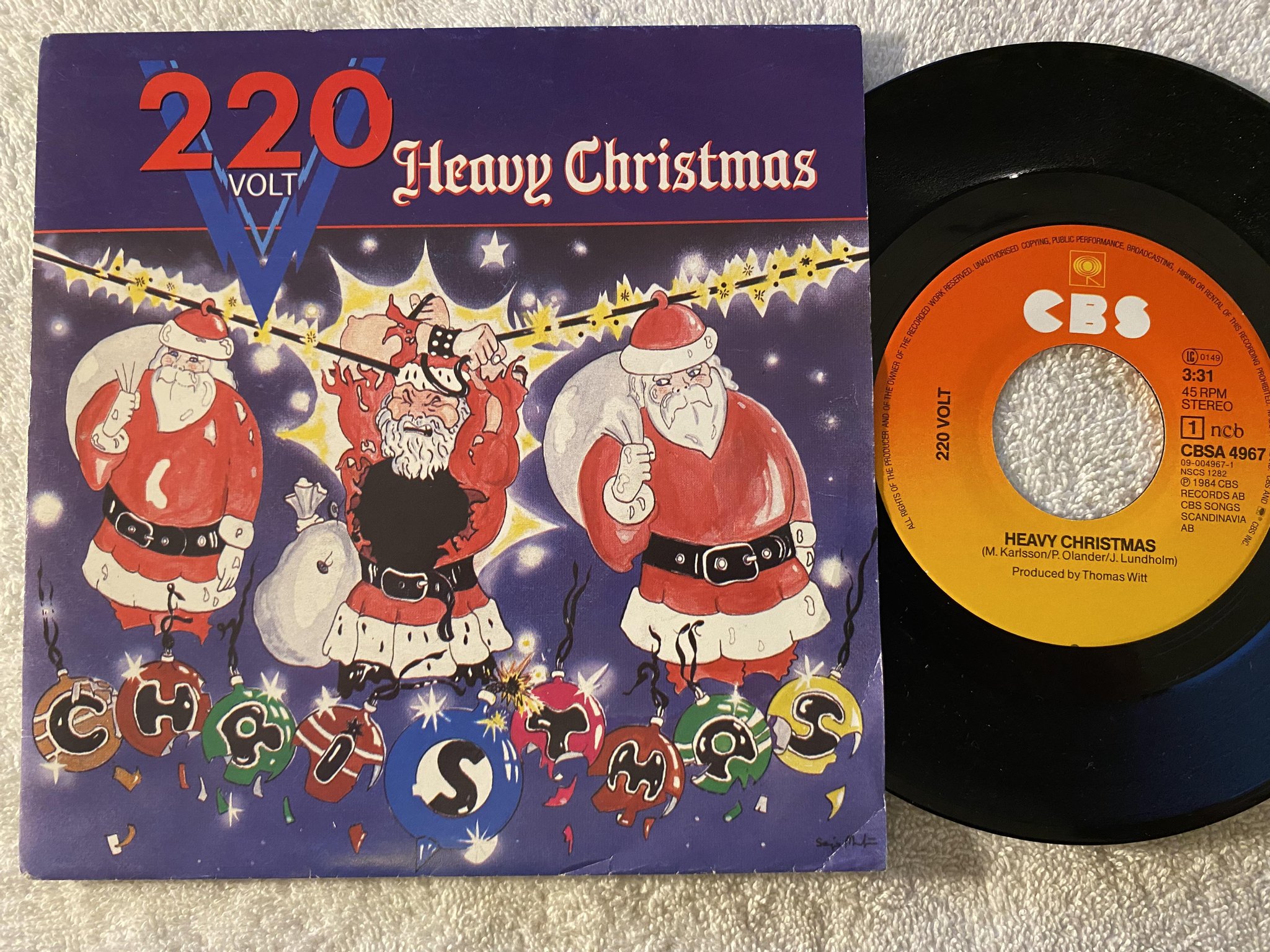Omslagsbild för skivan 220 VOLT heavy christmas 7"single -84 NCB CBS CBSA 4967