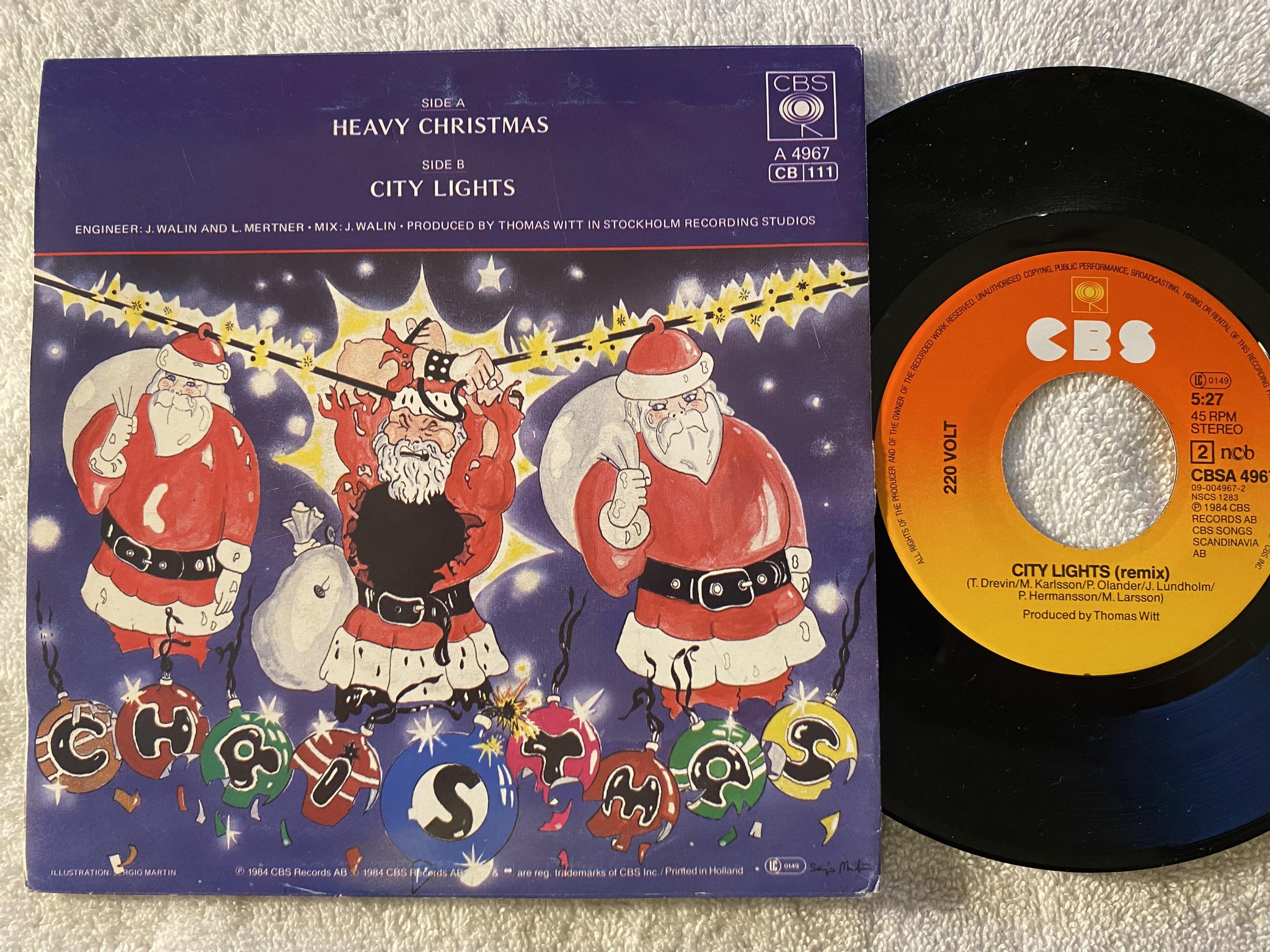 Omslagsbild för skivan 220 VOLT heavy christmas 7"single -84 NCB CBS CBSA 4967