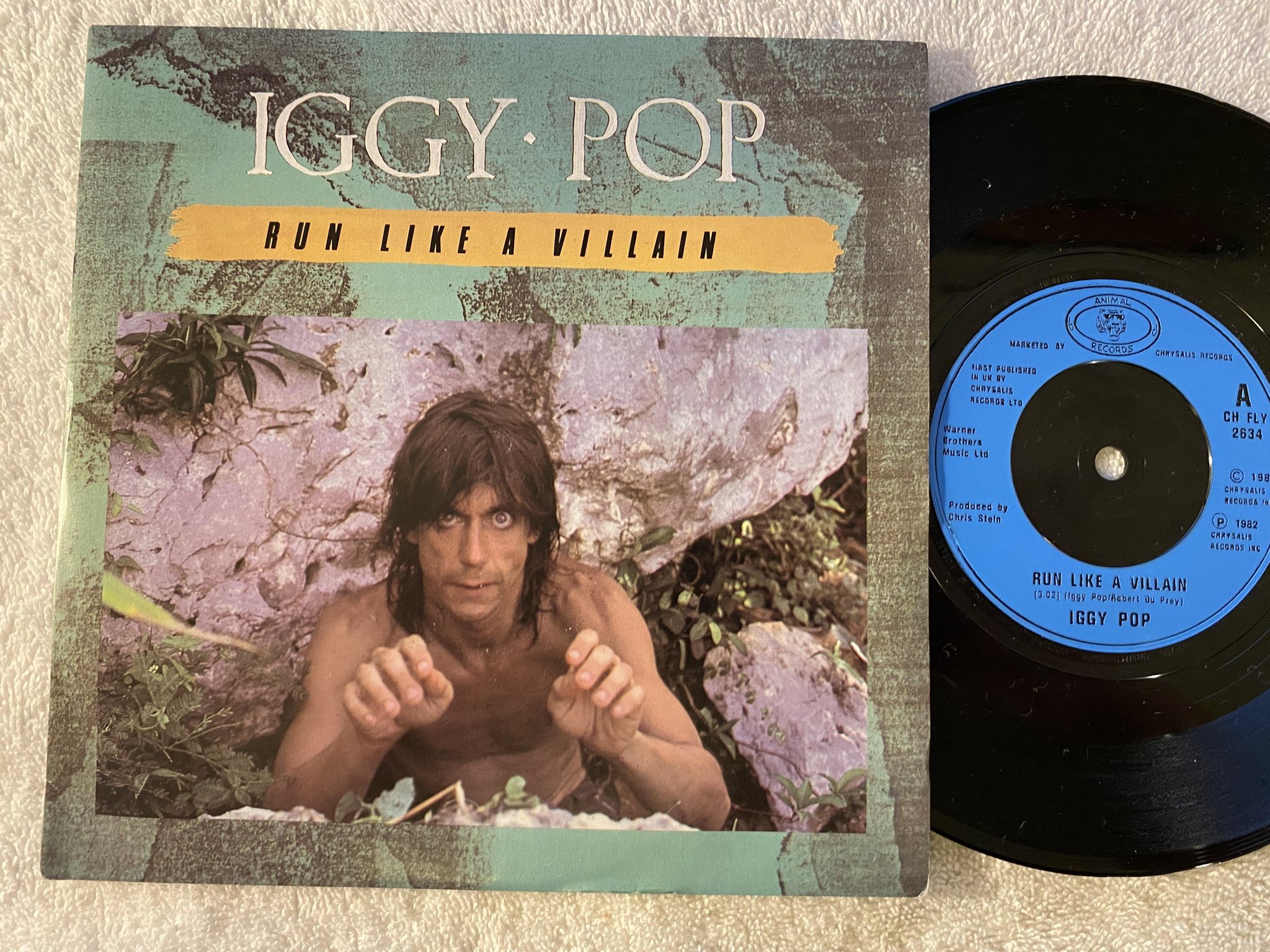 Omslagsbild för skivan IGGY POP run like a villain 7"single -82 UK ANIMAL CH FLY 2634