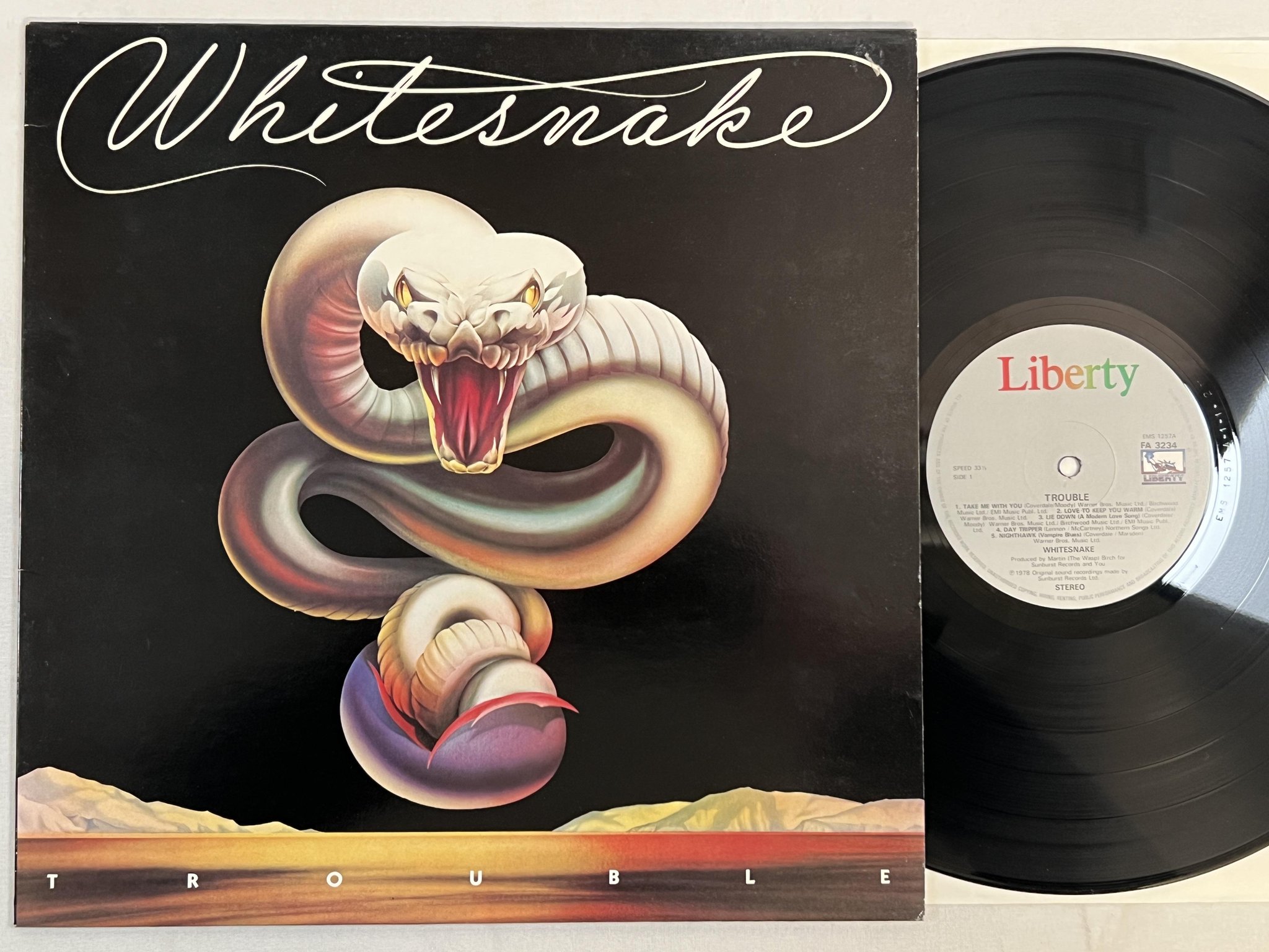 Omslagsbild för skivan WHITESNAKE trouble LP -78 UK LIBERTY FA 3234