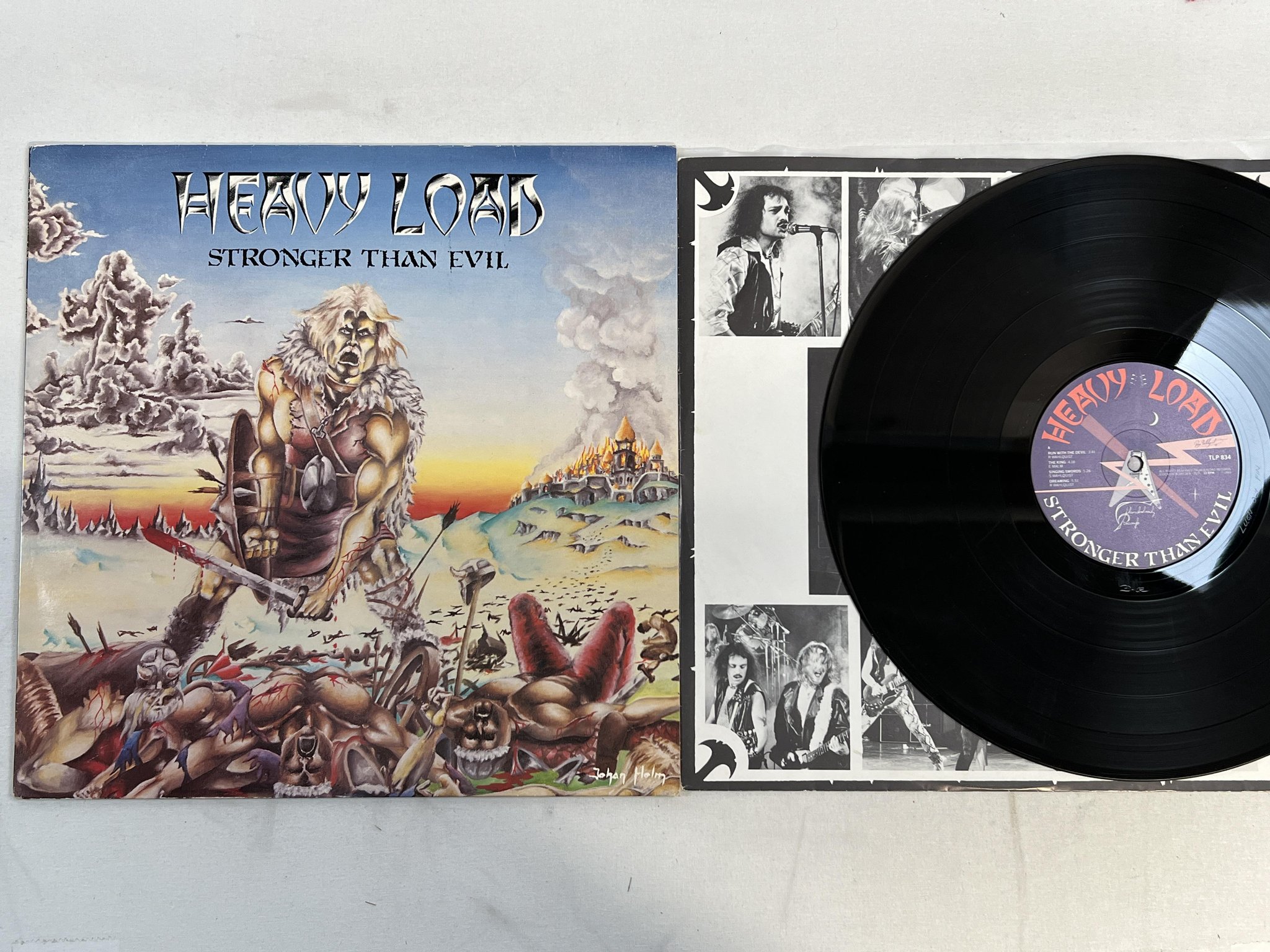 Omslagsbild för skivan HEAVY LOAD stronger than evil LP -83 Swe THUNDERLOAD TLP 834 ** RARE **
