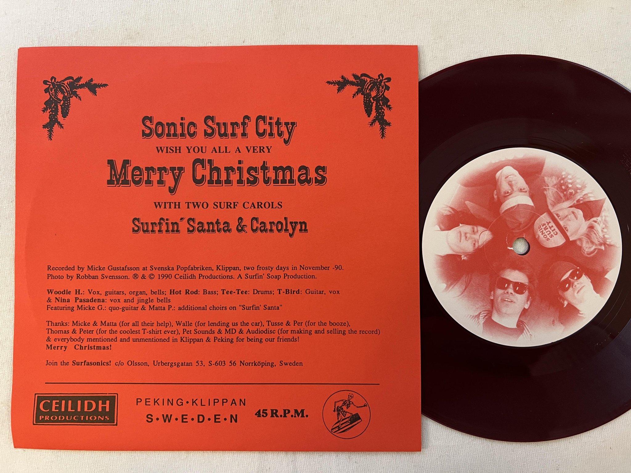 Omslagsbild för skivan SONIC SURF CITY surfin santa 7"single -90 Swe CEILIDH CEI 018 * red vinyl *