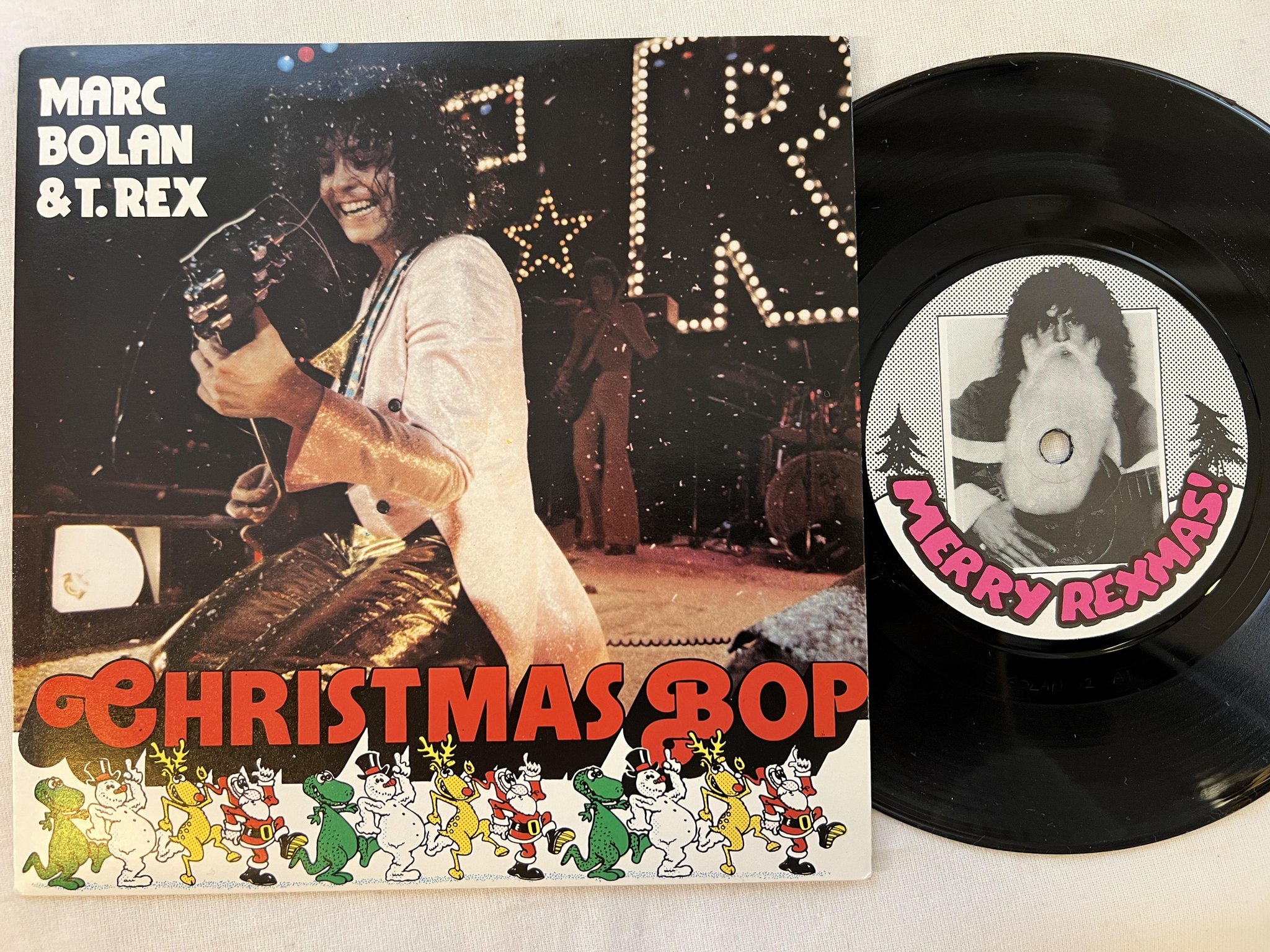 Omslagsbild för skivan MARC BOLAN & T. REX christmas bop 7"single -82 UK MARC ON WAX