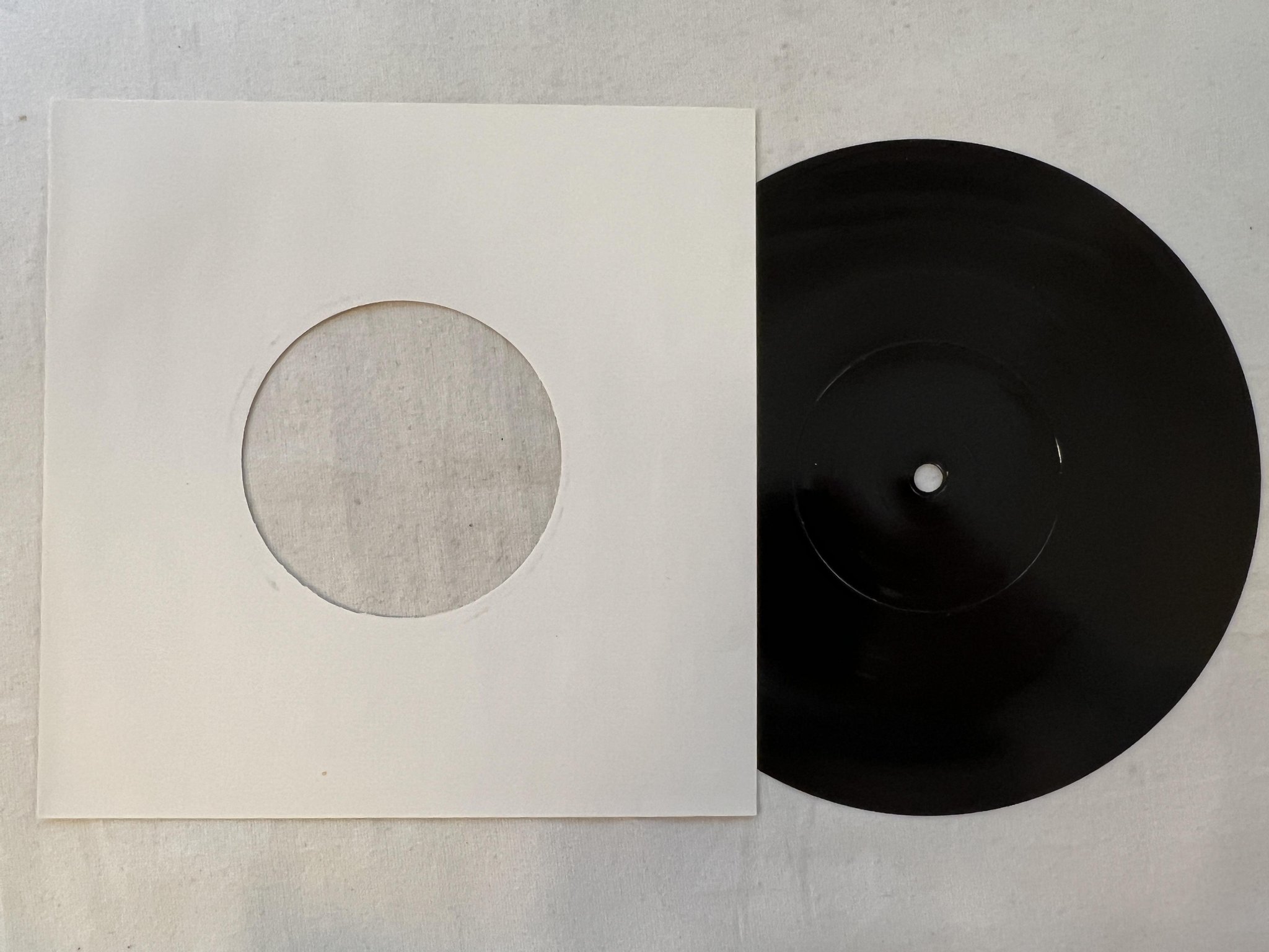 Omslagsbild för skivan NEW ORDER Merry Xmas From The Haçienda And Factory Records 7" flexi -82 **RARE**