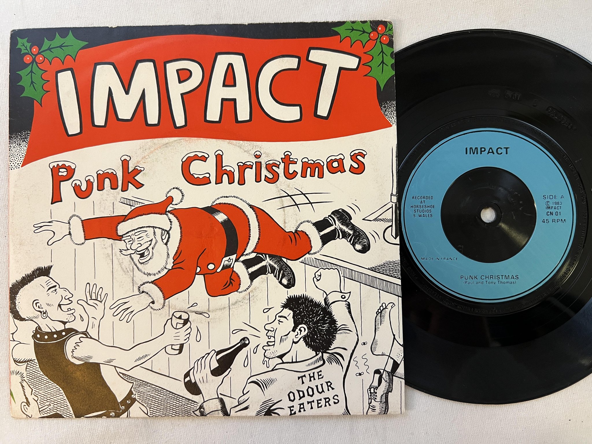 Omslagsbild för skivan IMPACT punk christmas 7"single -83 CYANIDE CN 01