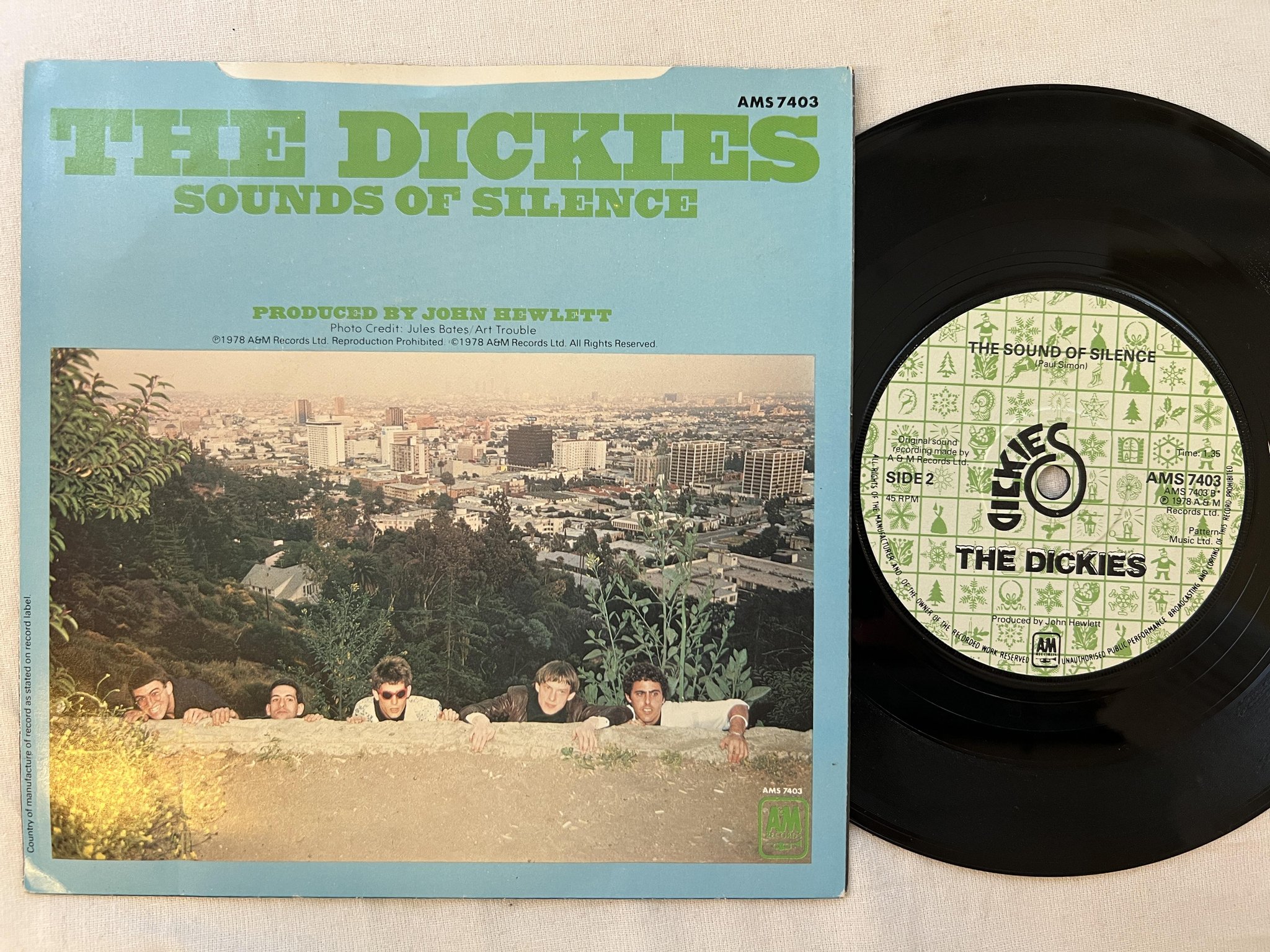Omslagsbild för skivan THE DICKIES silent night 7"single -78 UK A6M AMS 7403
