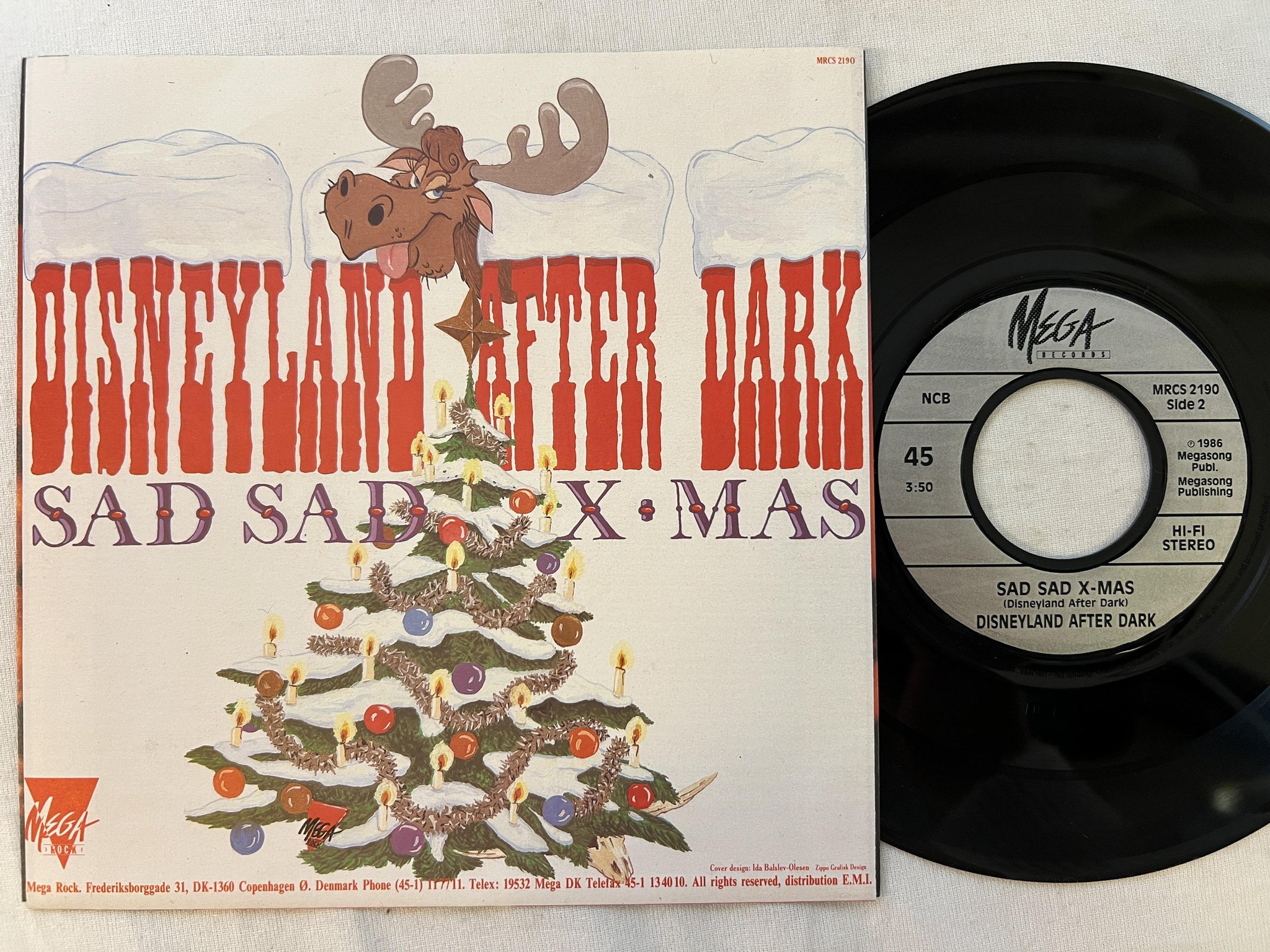 Omslagsbild för skivan DISNEYLAND AFTER DARK sad sad x-mas 7"single -86 ncm MEGA MRCS 2190