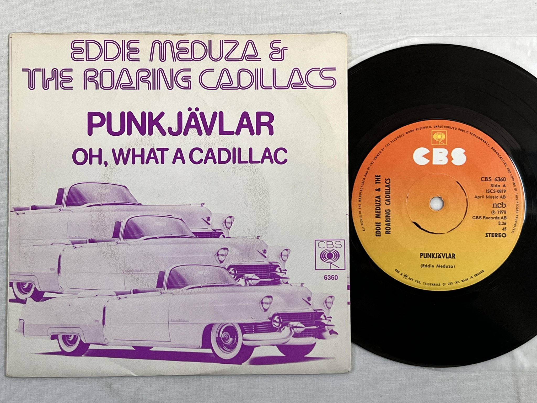 Omslagsbild för skivan EDDIE MEDUZA & THE ROARING CADILLACS punkjävlar 7"single CBS 6360