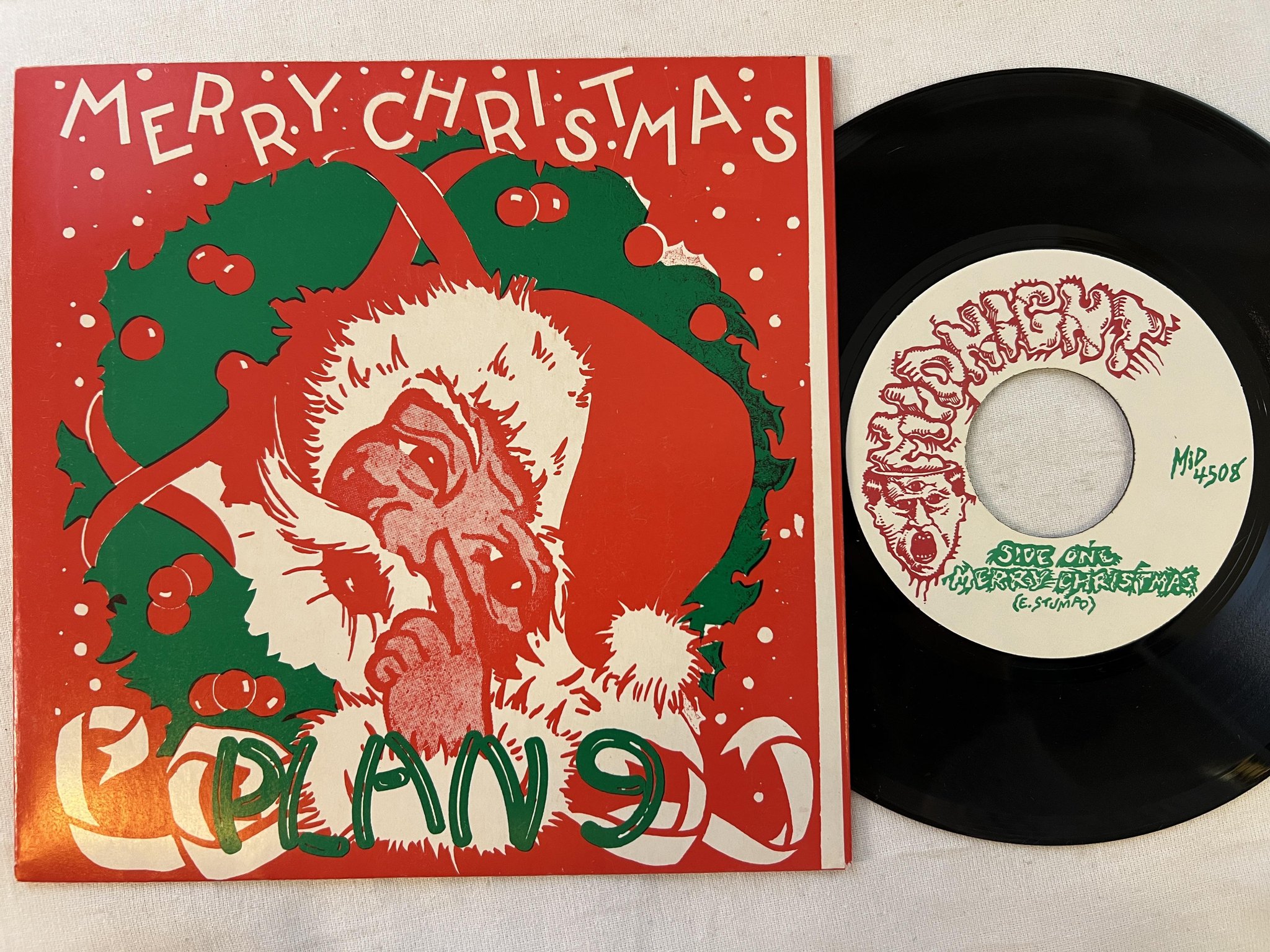 Omslagsbild för skivan PLAN 9 merry christmas 7"ep -85 US midnight MID 4508