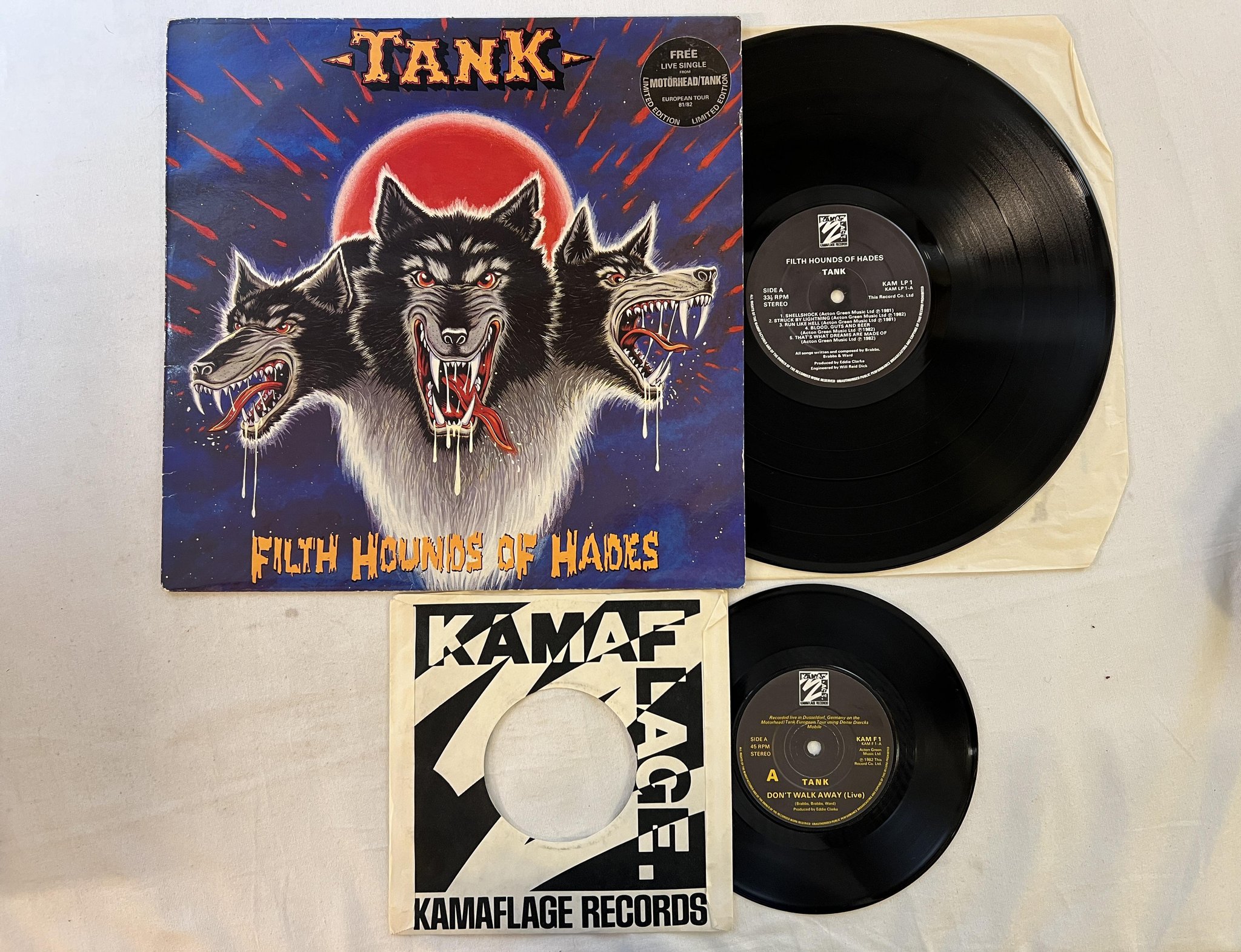 Omslagsbild för skivan TANK filth hounds of hades LP + 7"single -82 UK KAMAFLAGE KAM LP1